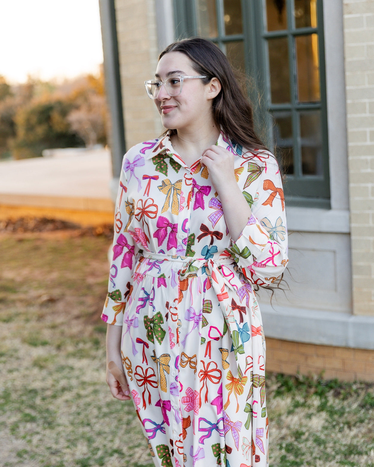 Model wearing the Nuggles® Rachel Dress in Bow Garden