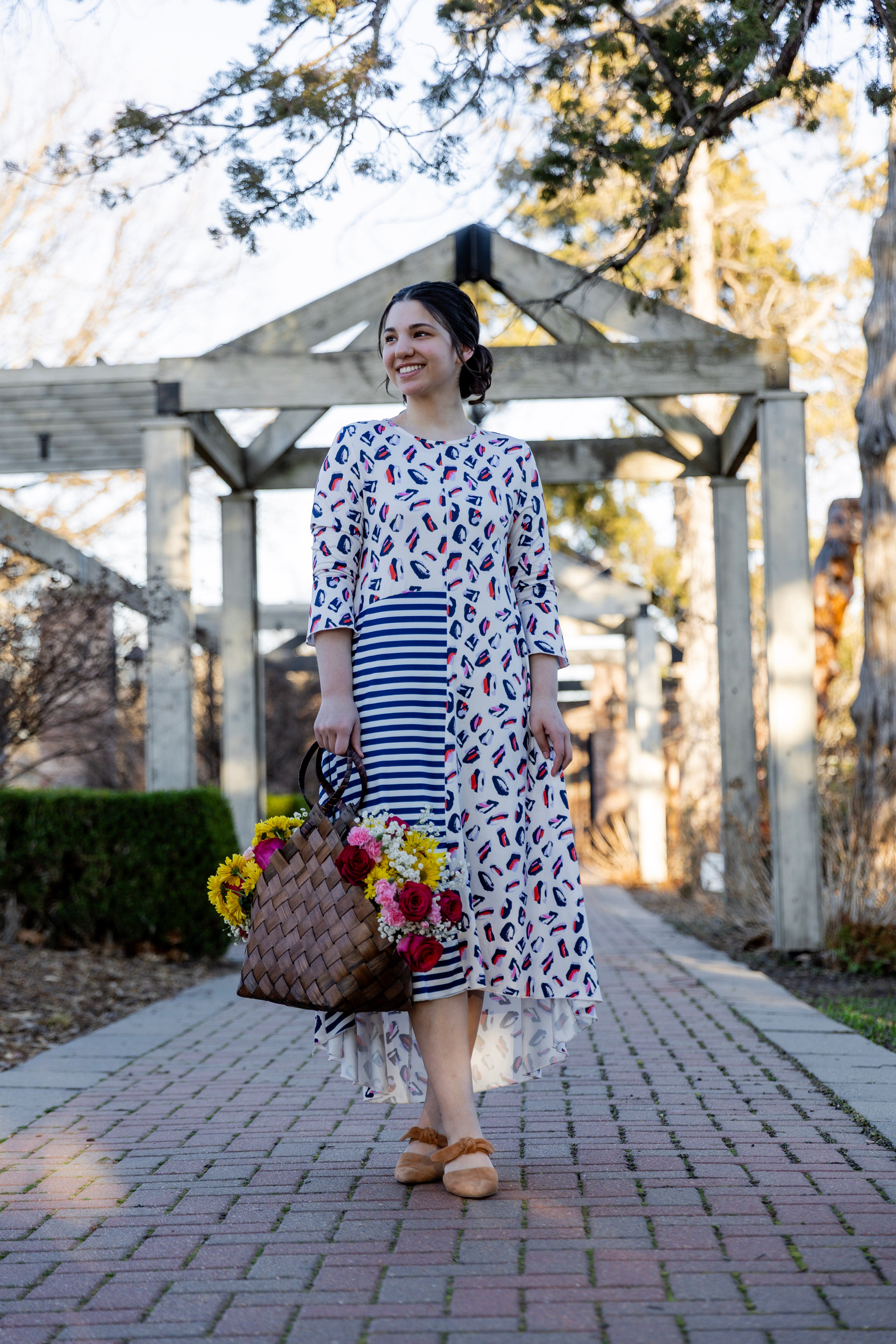 Modest high low knit dress with asymmetrical hem, ruffle sleeves, and mixed front prints – Kristine Dress by Nuggles®