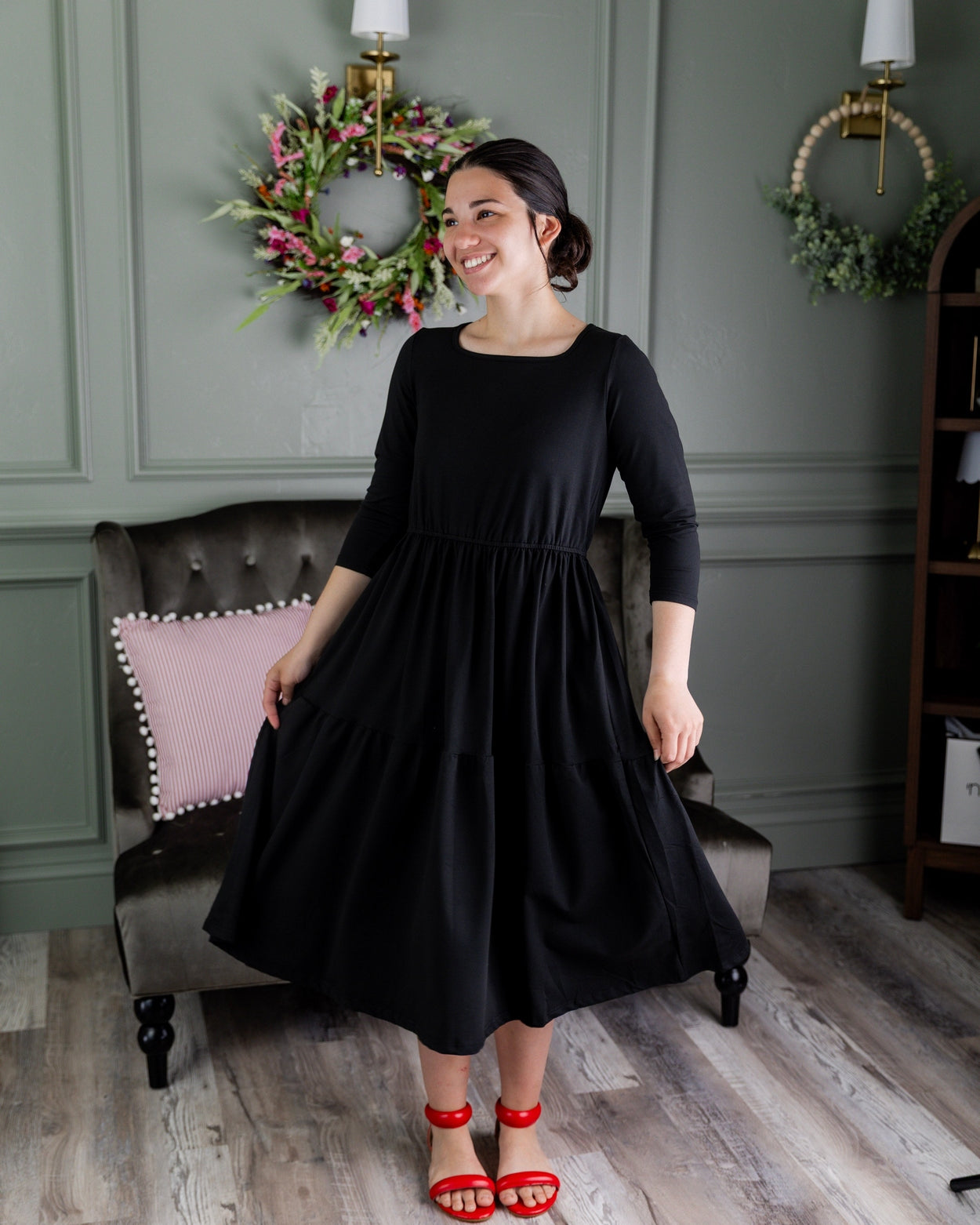 Model wearing Nuggles® Nova Dress in Black