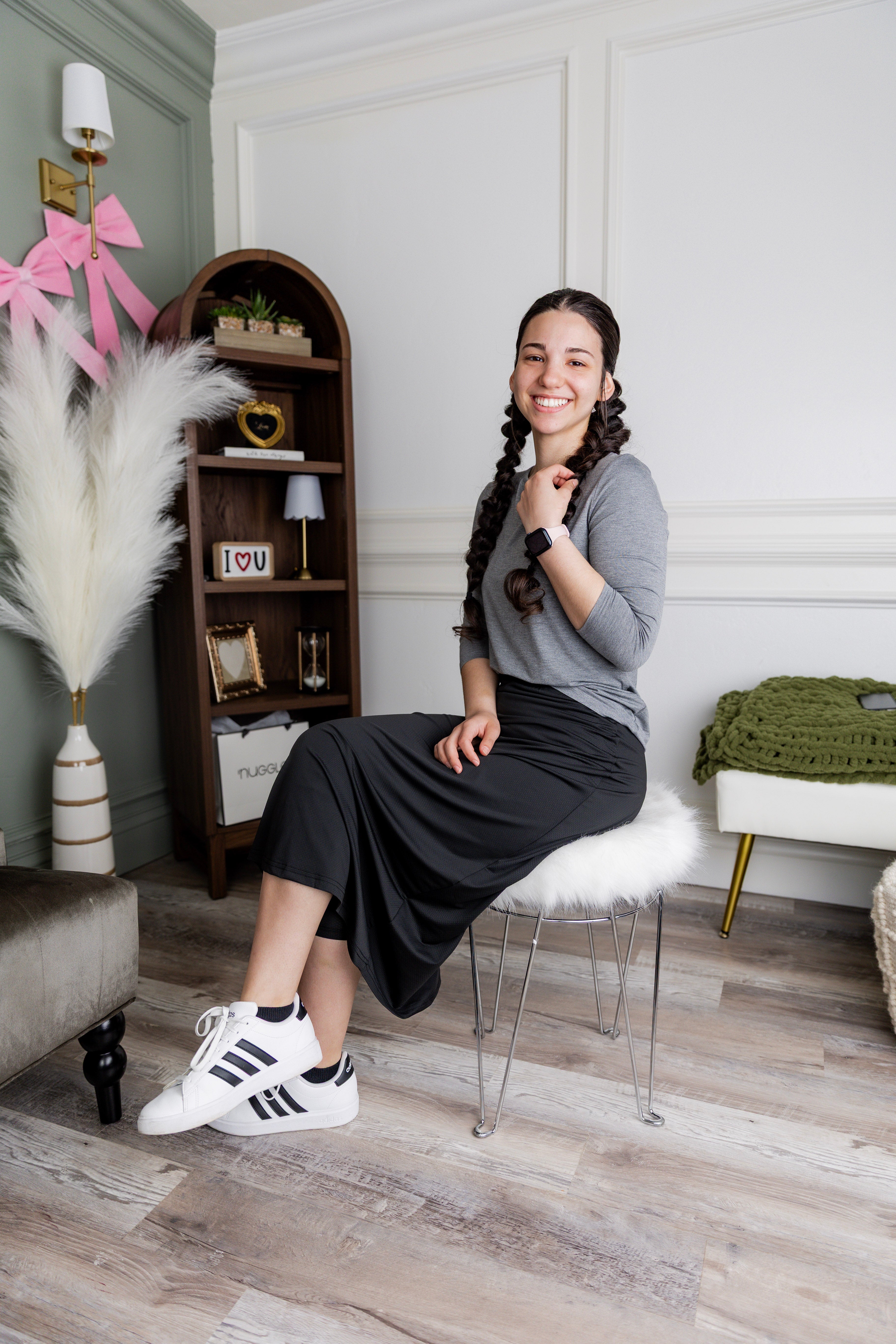 Model wearing Nuggles® 31" All-Sport Skirt in Black