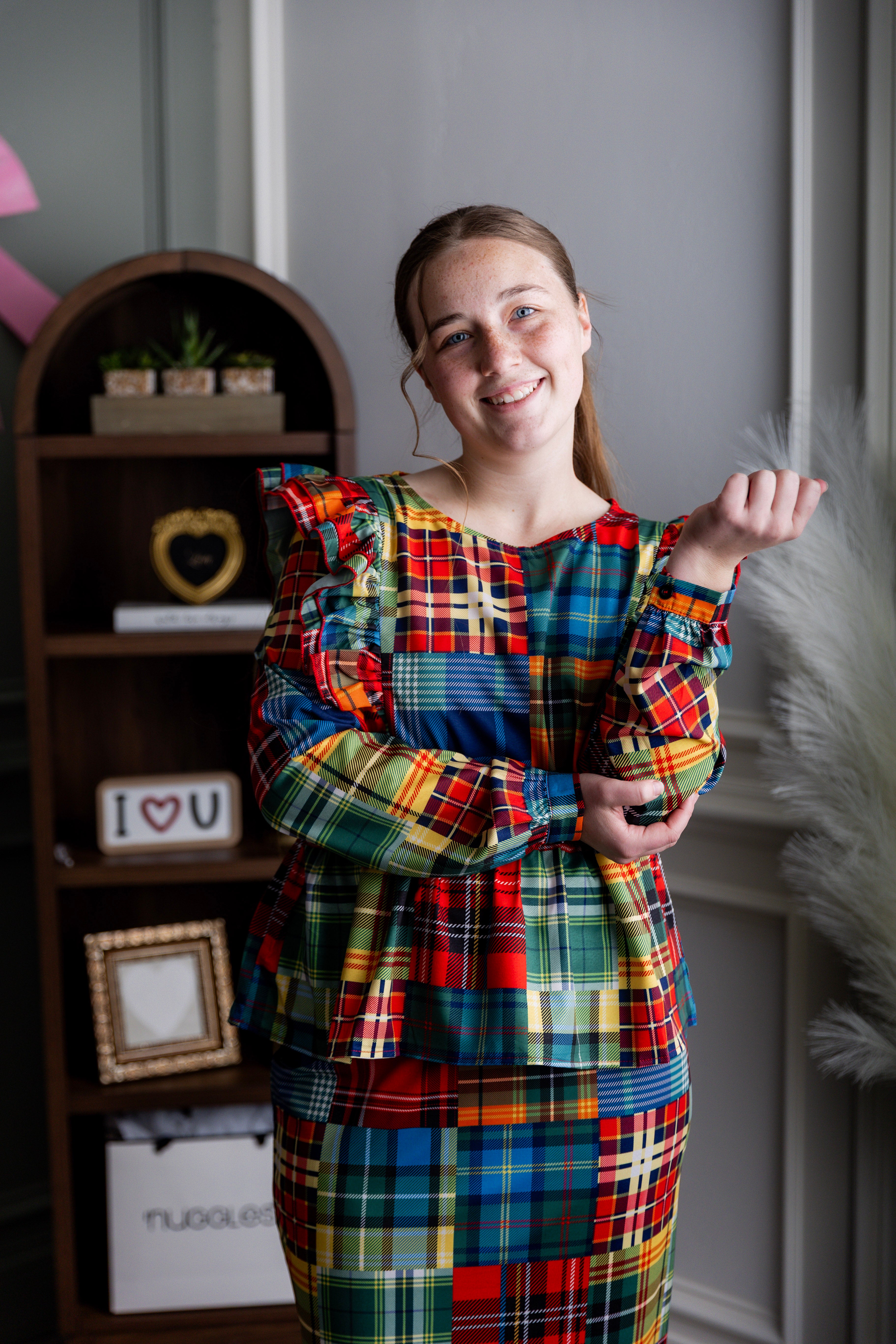 Model wearing Nuggles® Rae Top in Patch Plaid