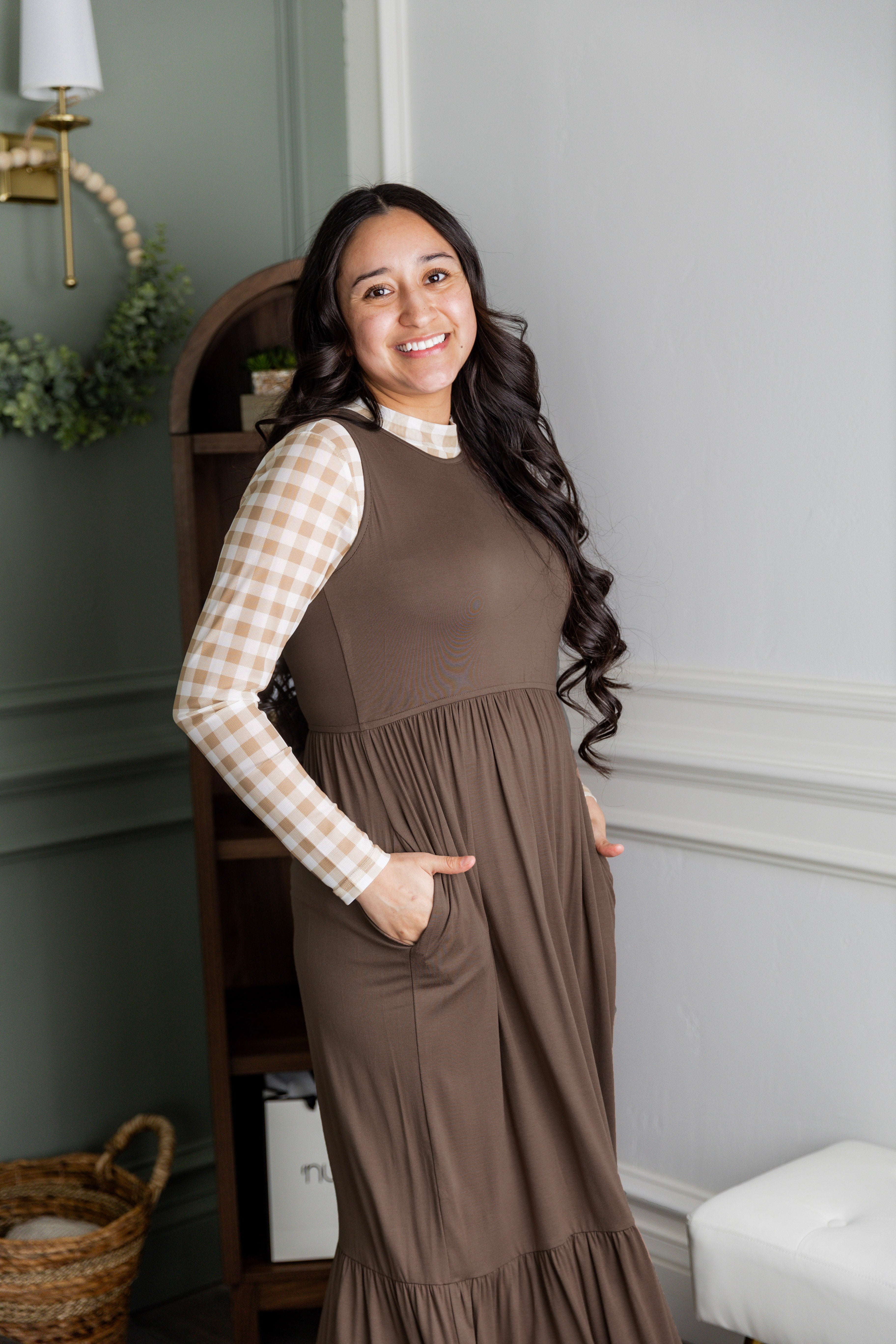 Model wearing the Nuggles® Riley Dress in Mocha Brown