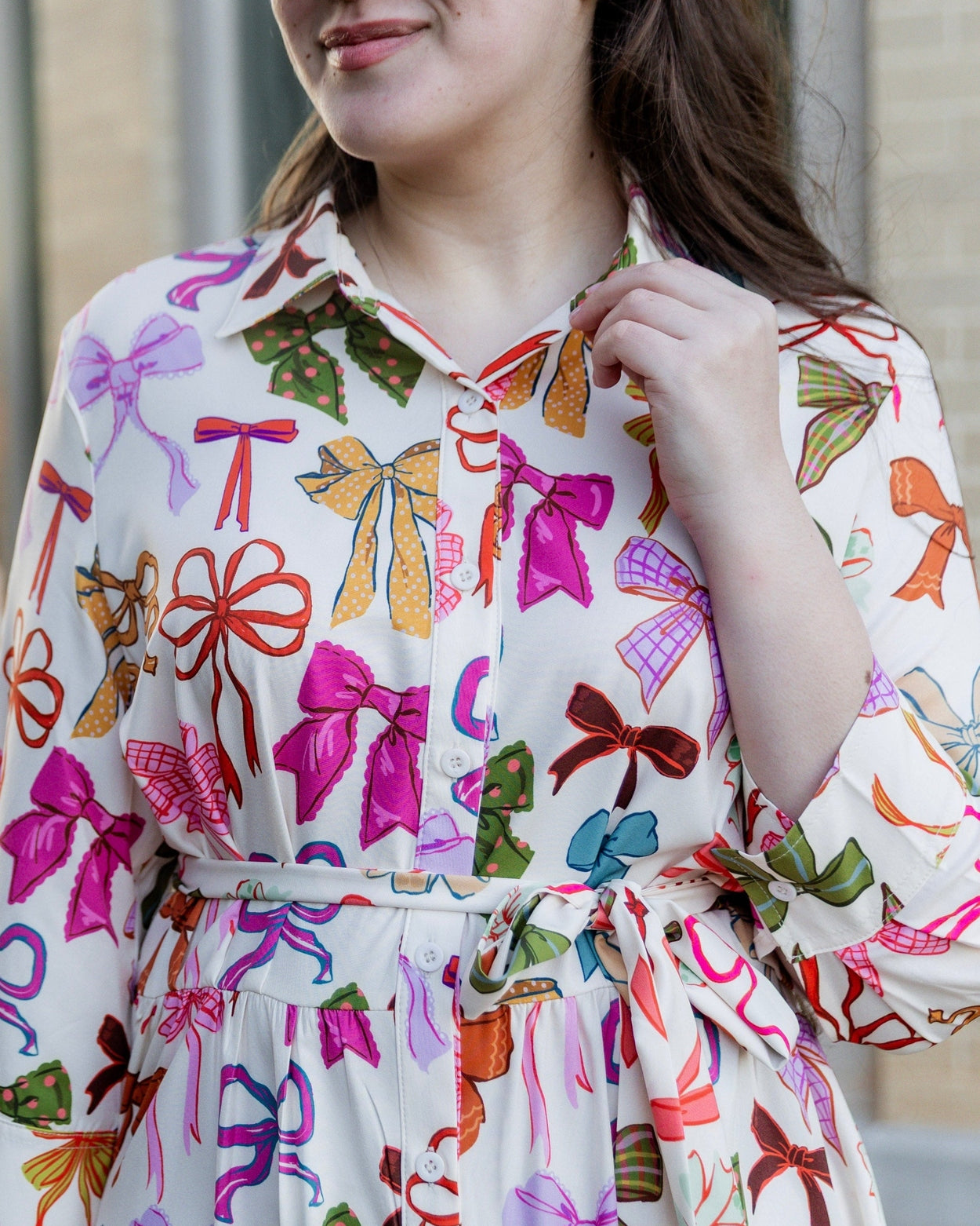 Model wearing the Nuggles® Rachel Dress in Bow Garden