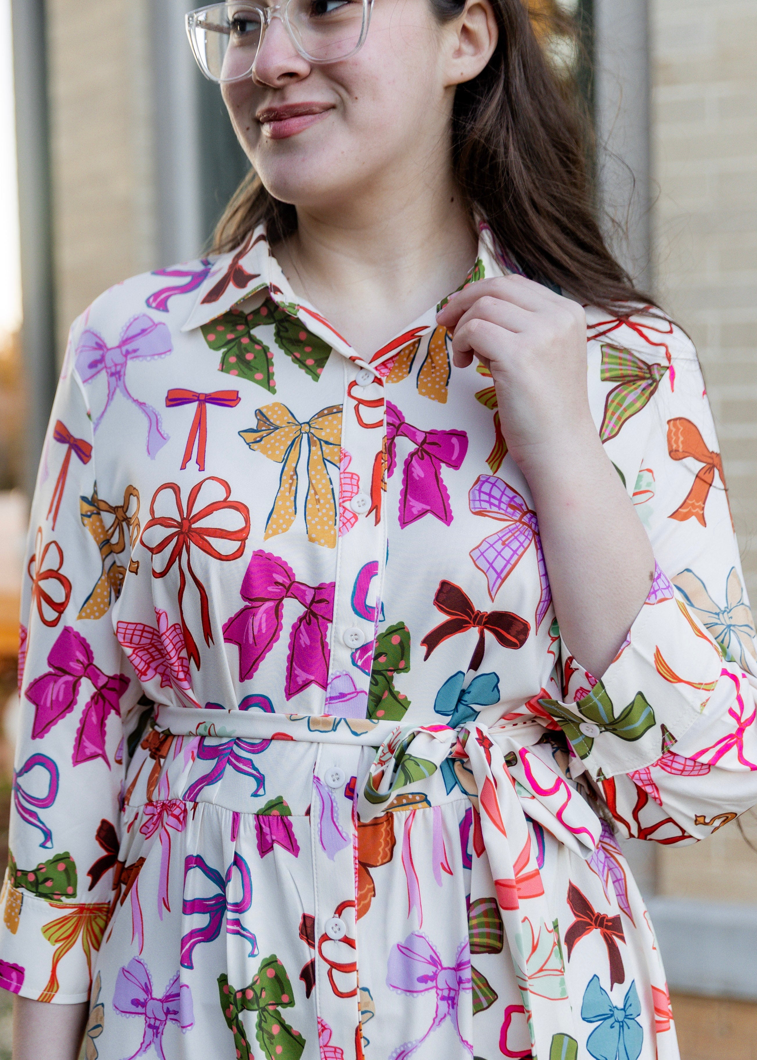 Model wearing the Nuggles® Rachel Dress in Bow Garden