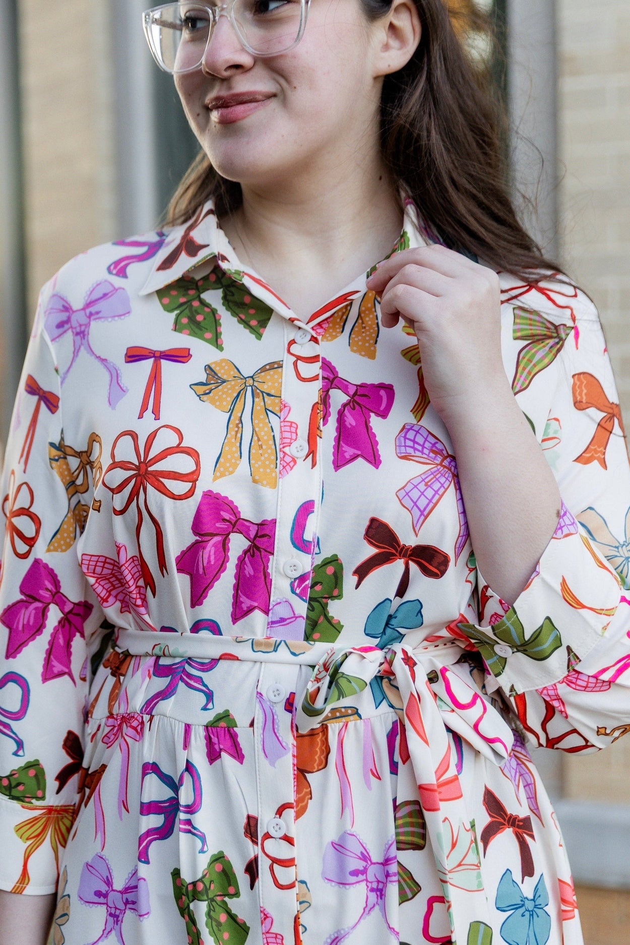 Model wearing the Nuggles® Rachel Dress in Bow Garden