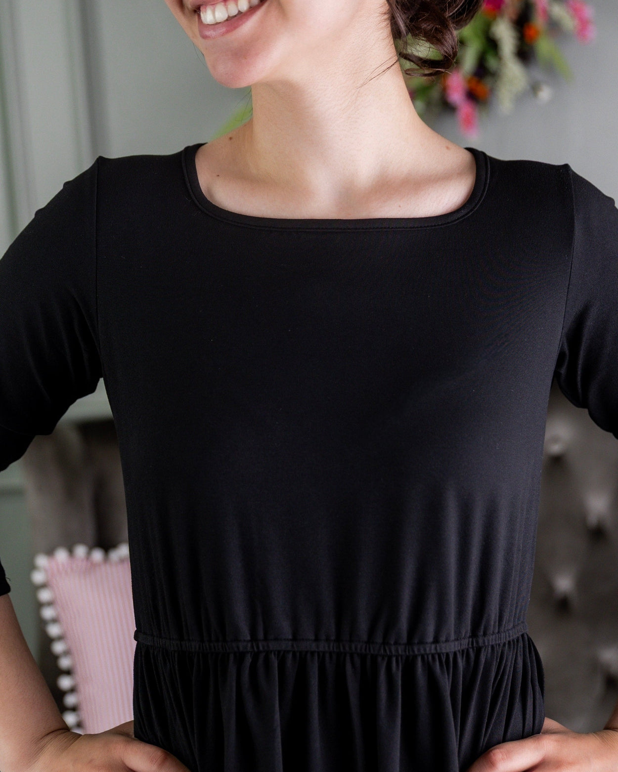 Model wearing Nuggles® Nova Dress in Black