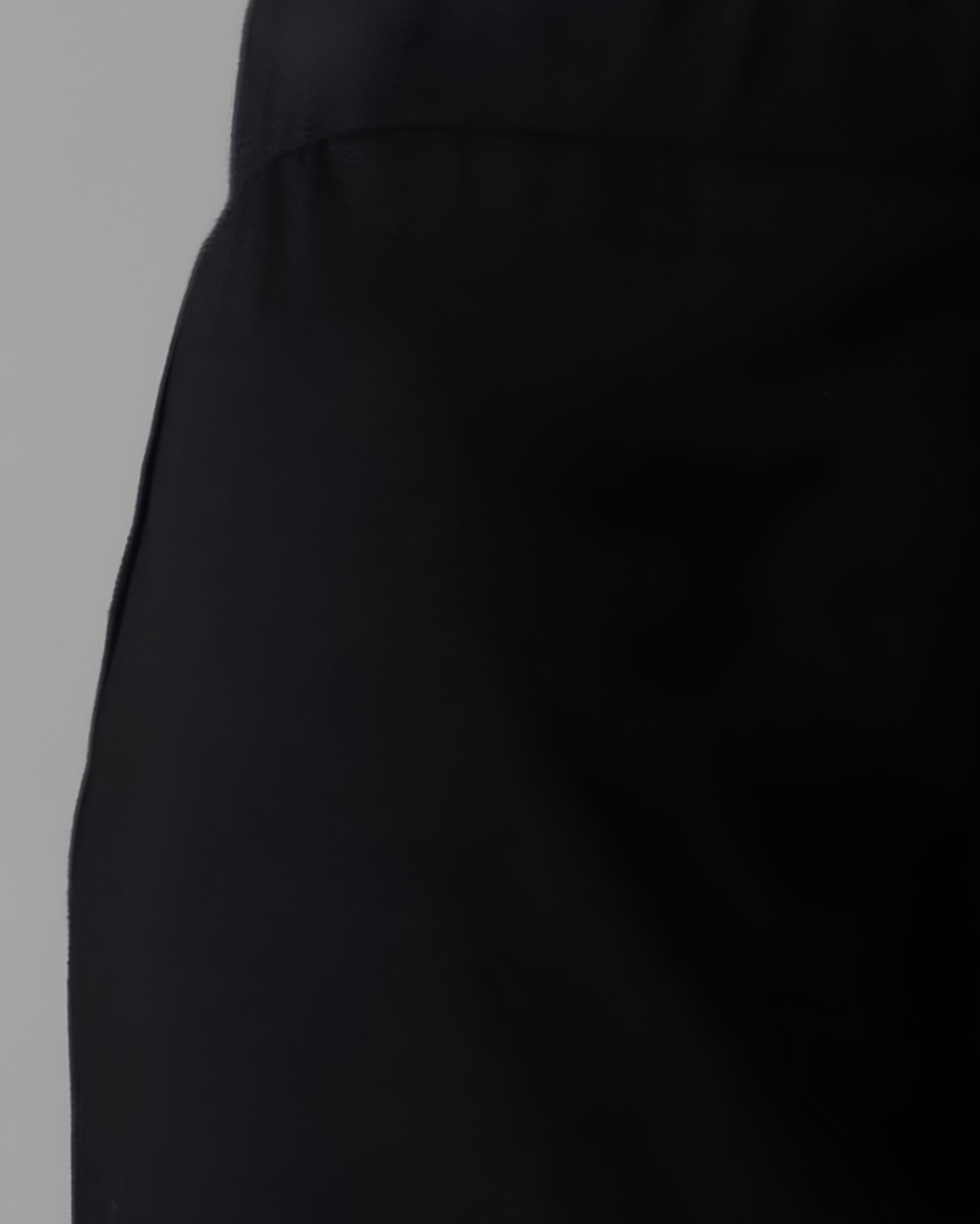 Model wearing Nuggles® Relaxed Midi Skirt in Black