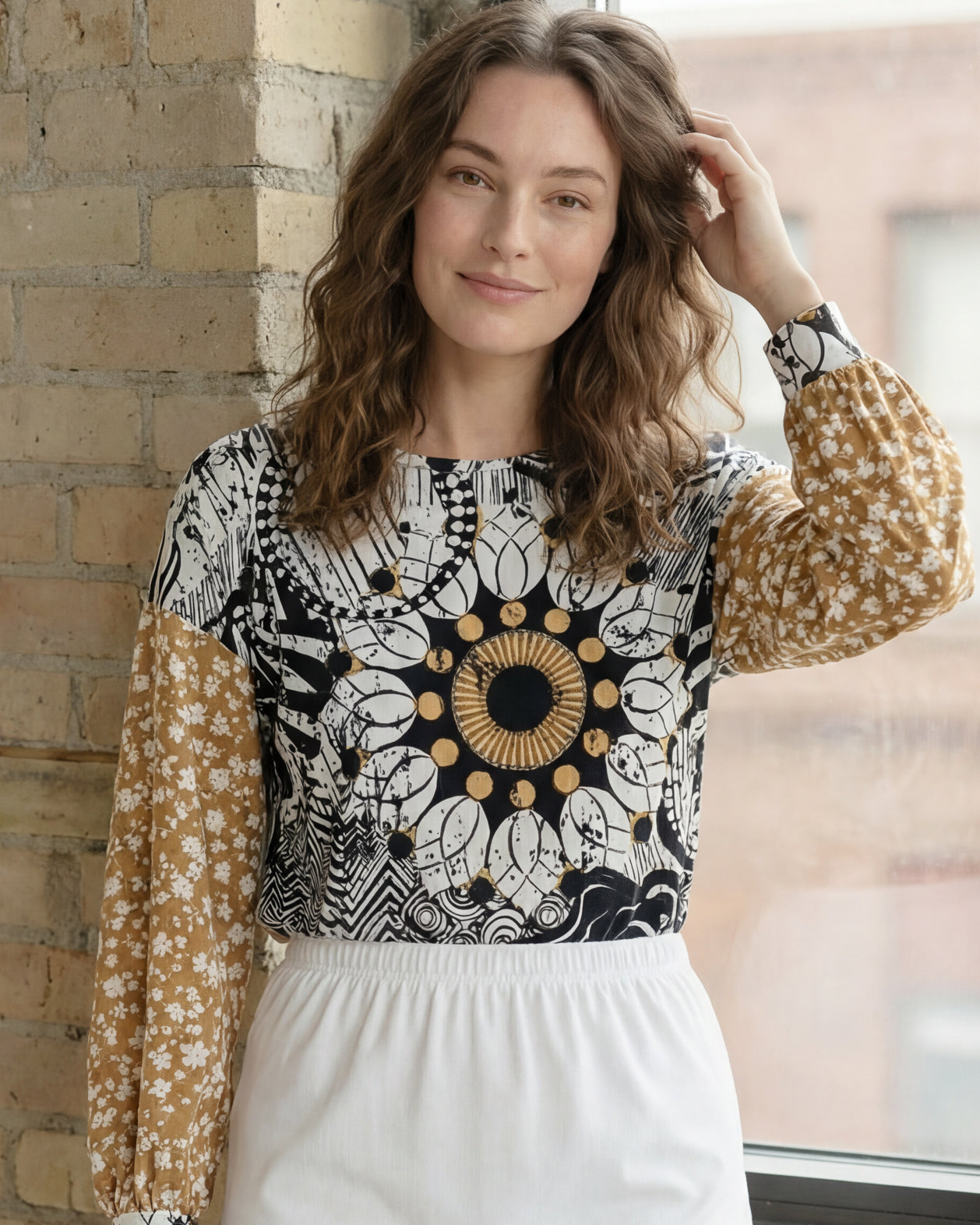 Model wearing Nuggles® Bryauna Top in Sunlit Collage