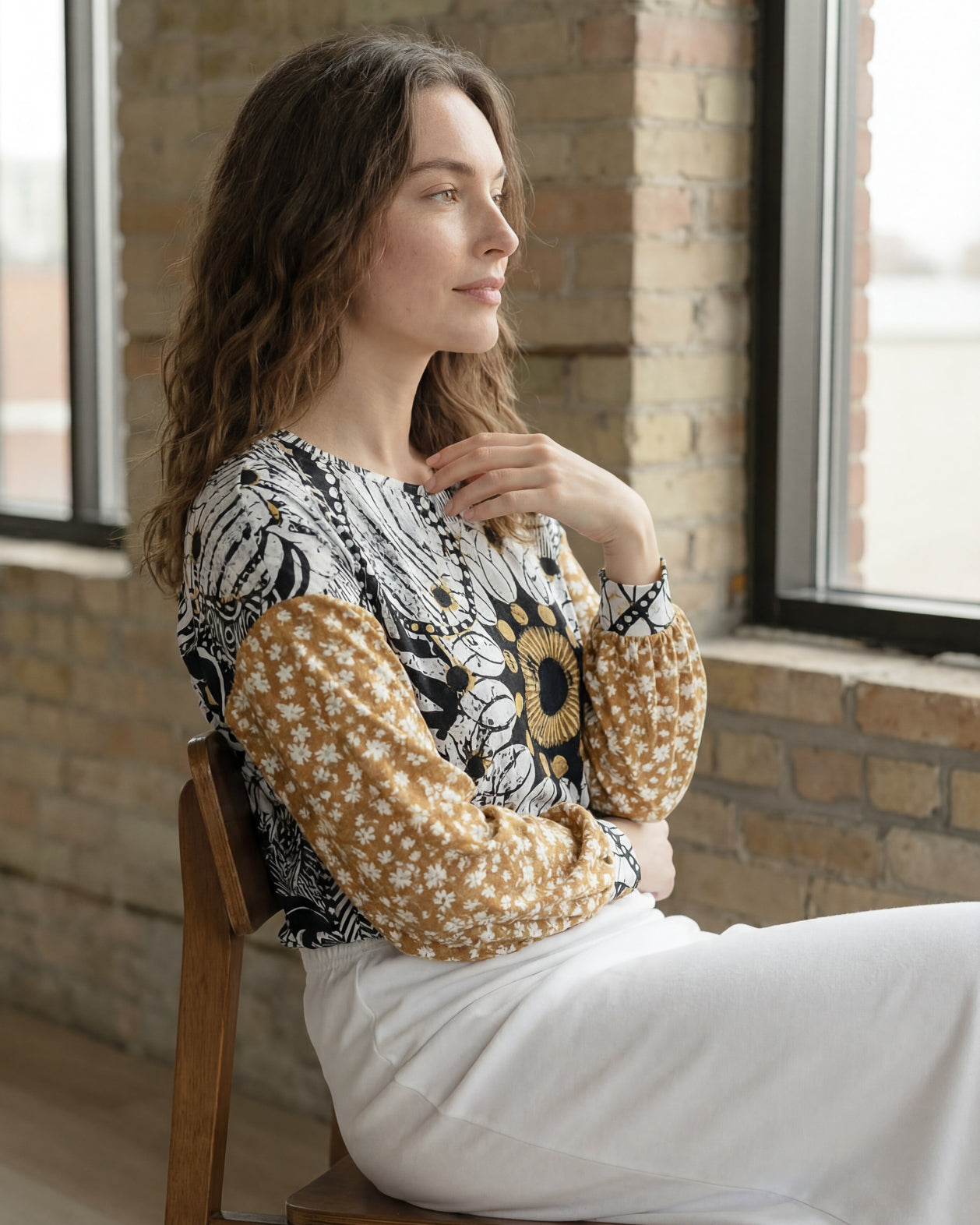 Model wearing Nuggles® Bryauna Top in Sunlit Collage