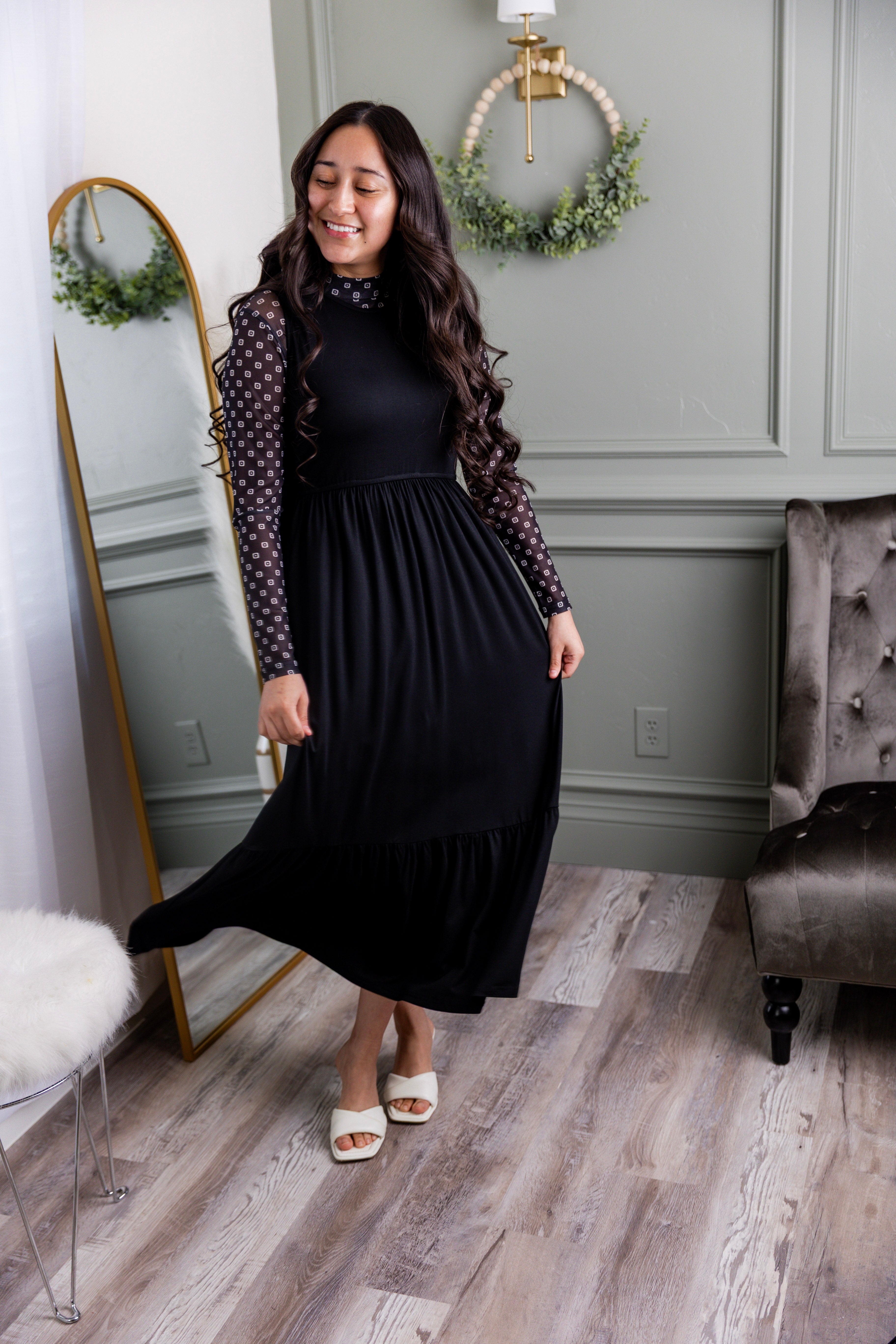 Model wearing the Nuggles® Riley Dress in Black