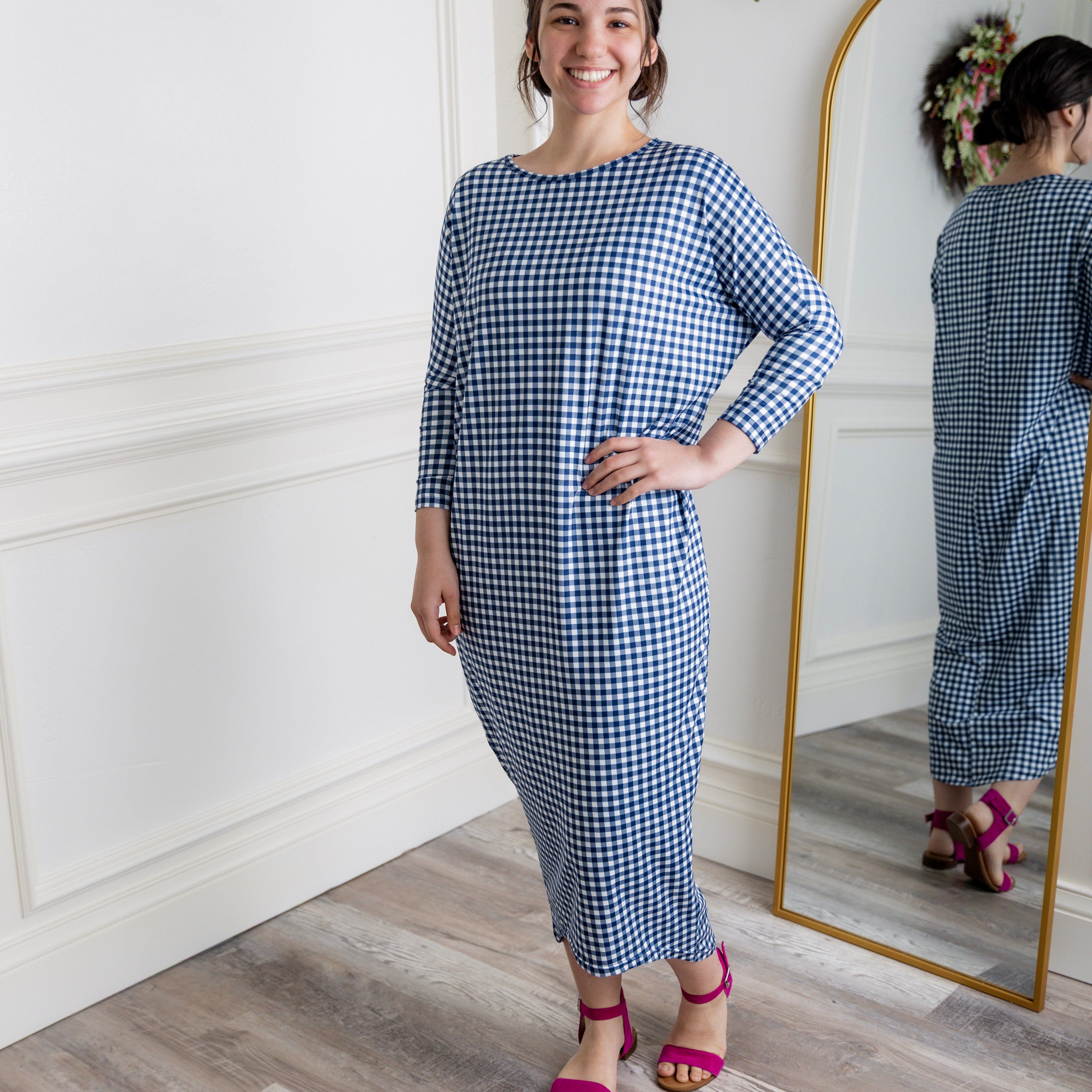 Modest dolman sleeve dress for women with relaxed fit and tapered hem, made from soft stretch knit fabric – perfect for everyday wear.