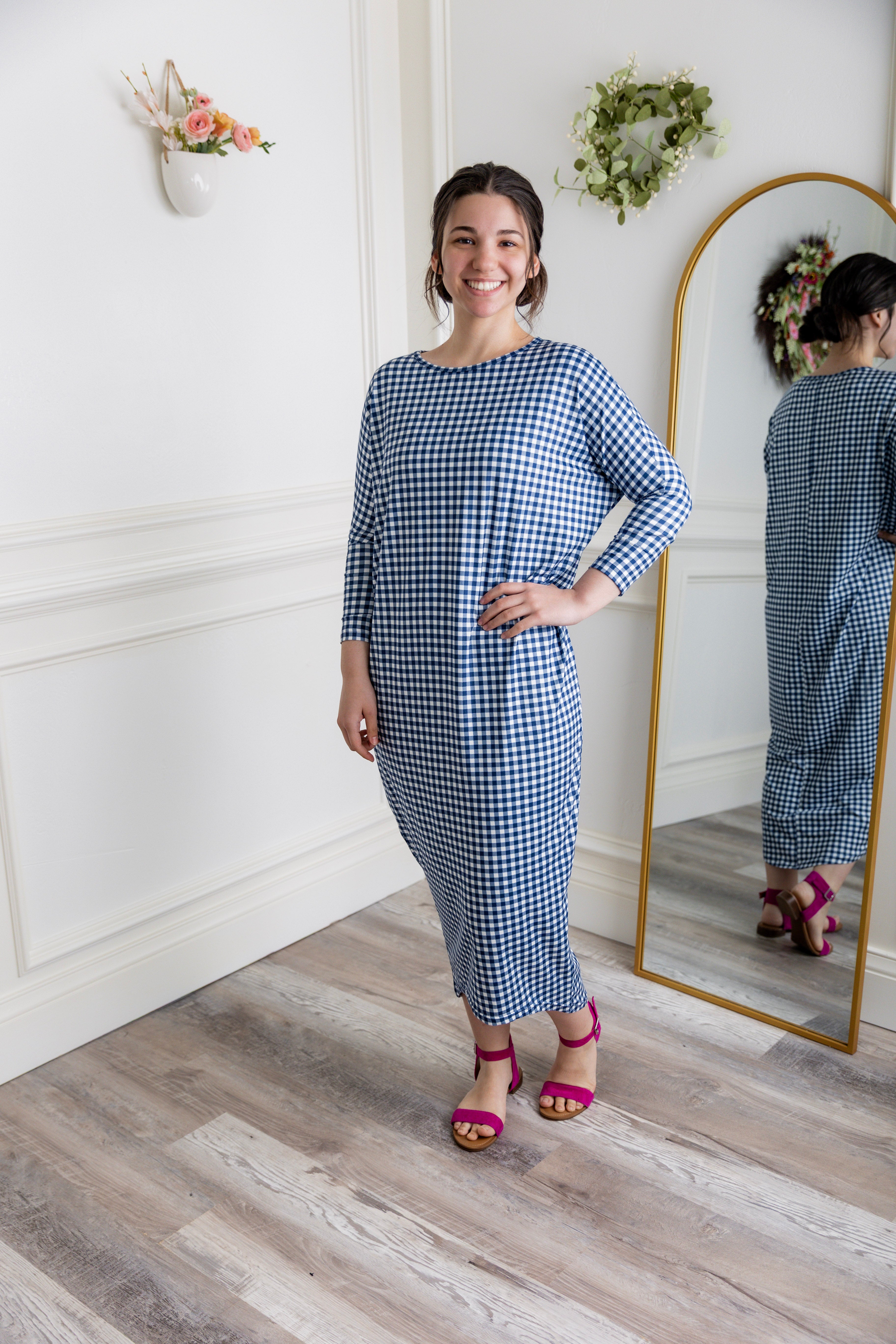 Modest dolman sleeve dress for women with relaxed fit and tapered hem, made from soft stretch knit fabric – perfect for everyday wear.