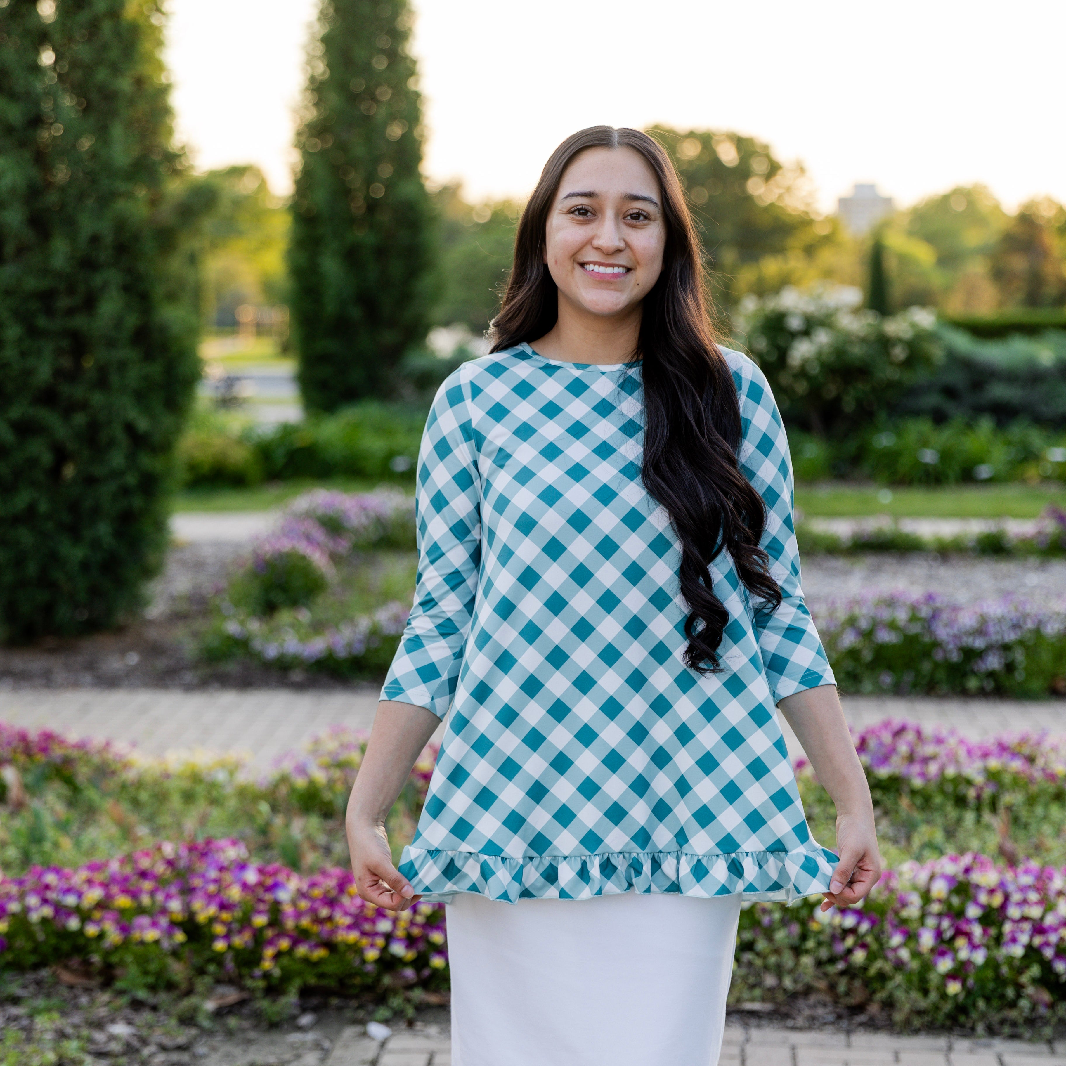 Model wearing the Avery Top, featuring modest 3/4 sleeves and a flowy, flattering fit.