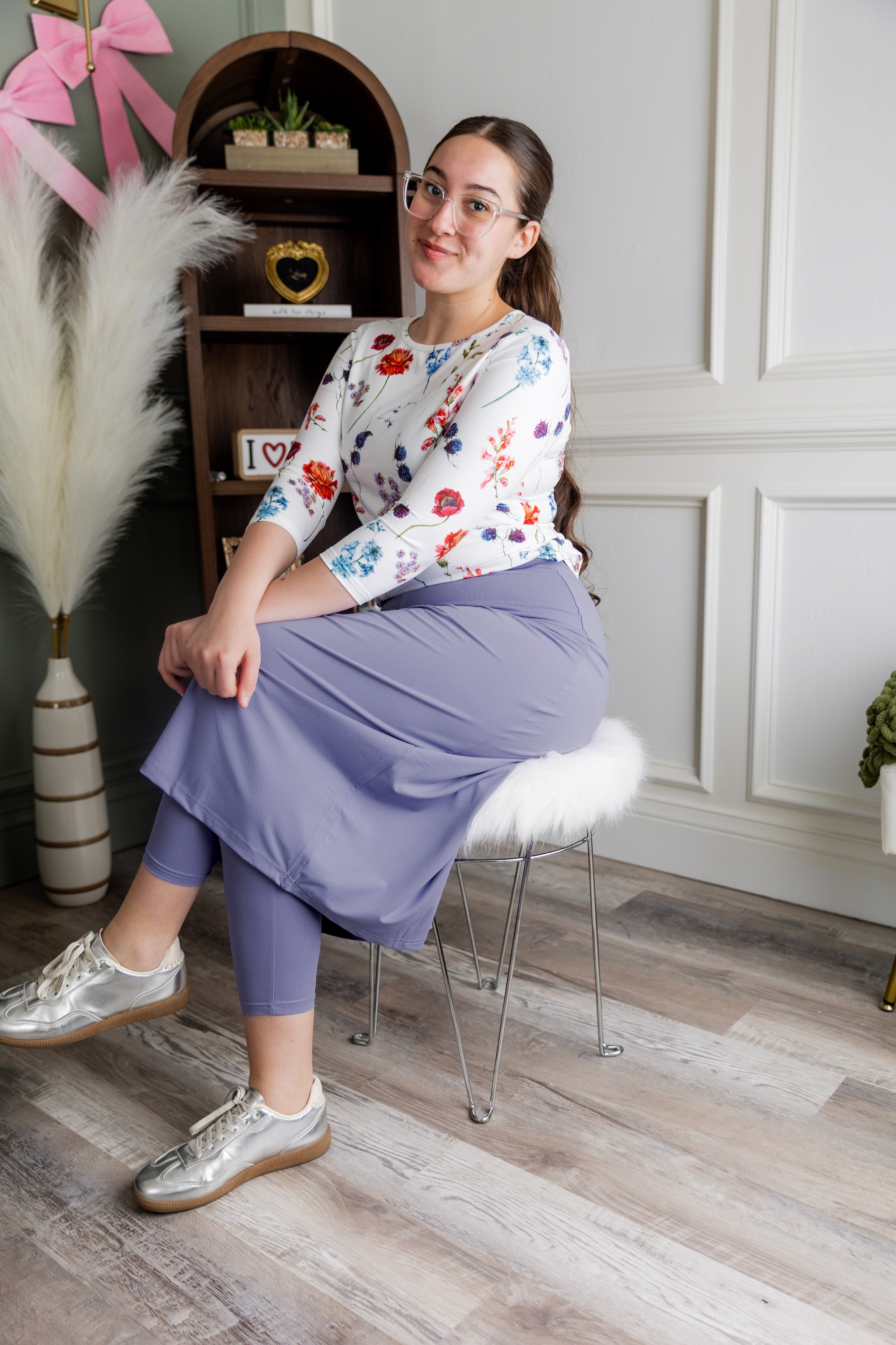 Model wearing Nuggles® 31" All-Sport Skirt in Pastel Purple