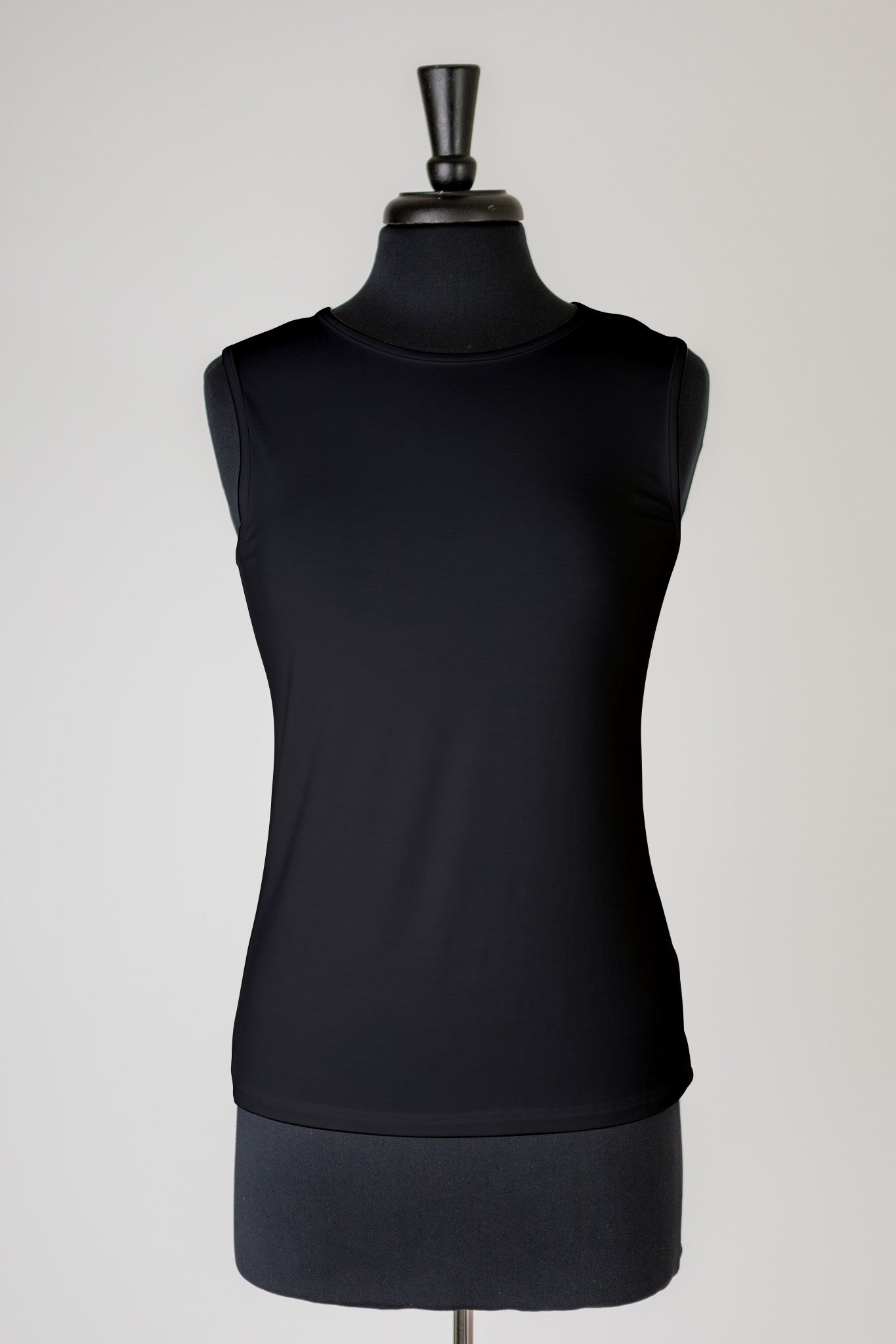 The Nuggles® Essential Tank – a modest, fitted layering tank top with wide straps and a high neckline, perfect for everyday wear.