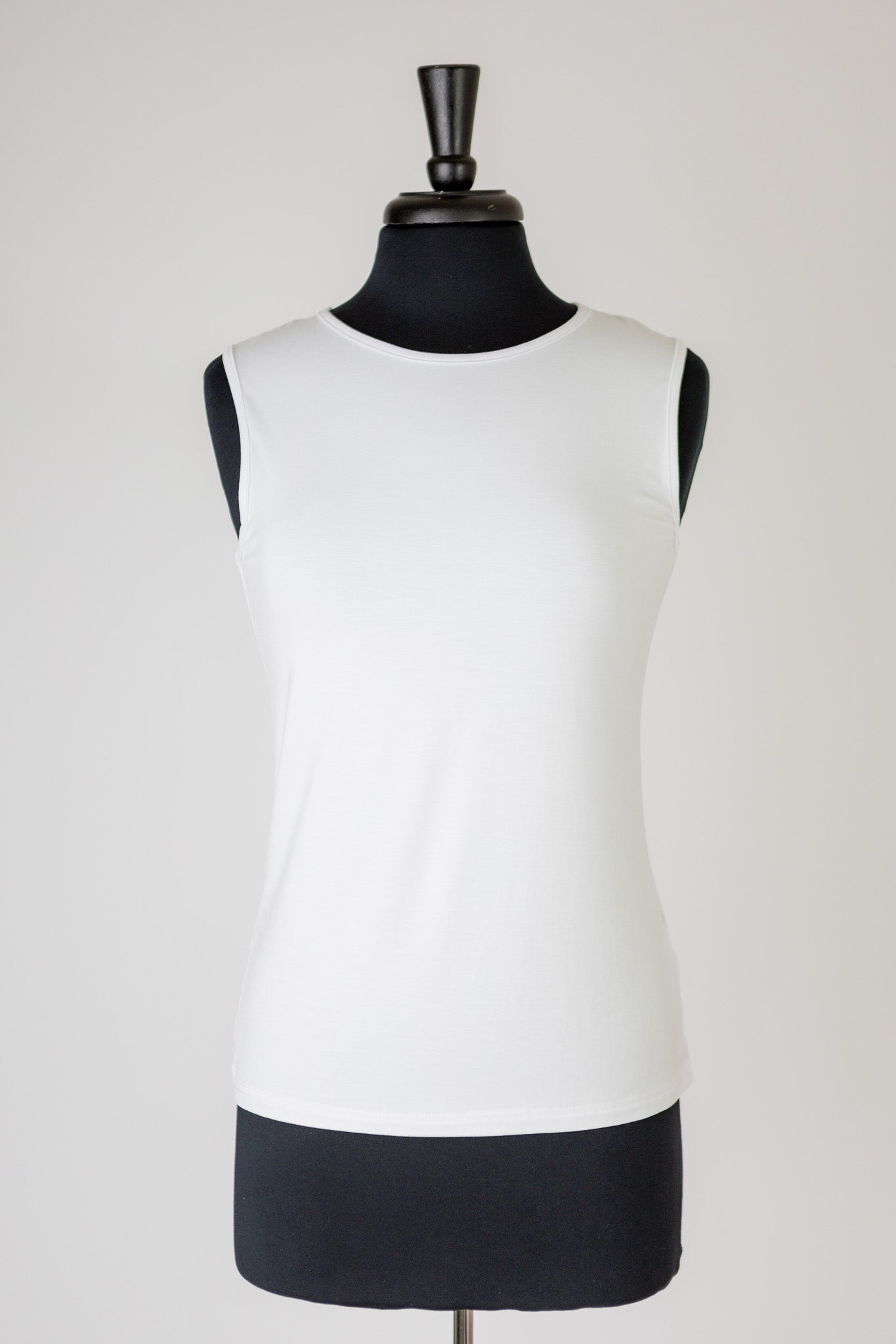 The Nuggles® Essential Tank – a modest, fitted layering tank top with wide straps and a high neckline, perfect for everyday wear.