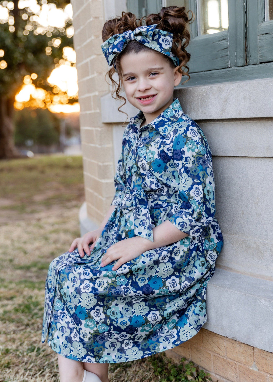 Model in Nuggles® Girls' Rachel Dress in Storm Brush