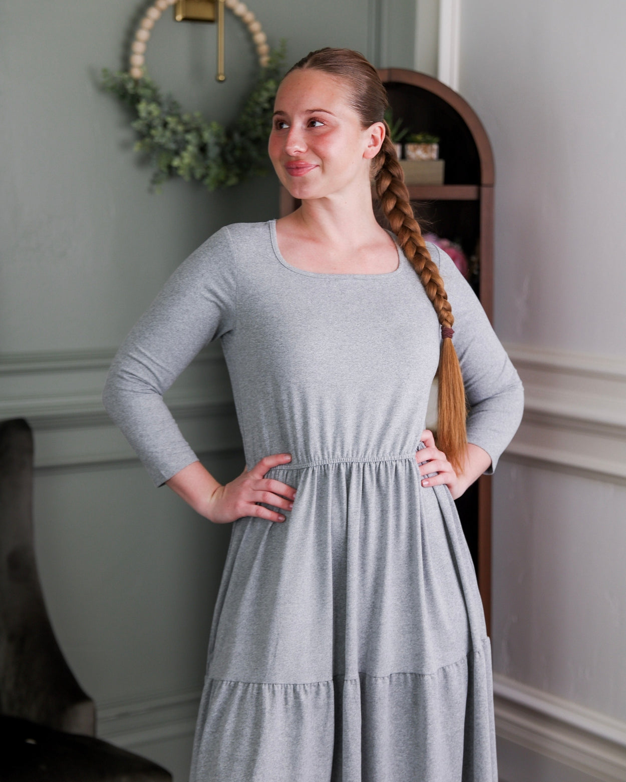 Model wearing Nuggles® Nova Dress in Heather Gray