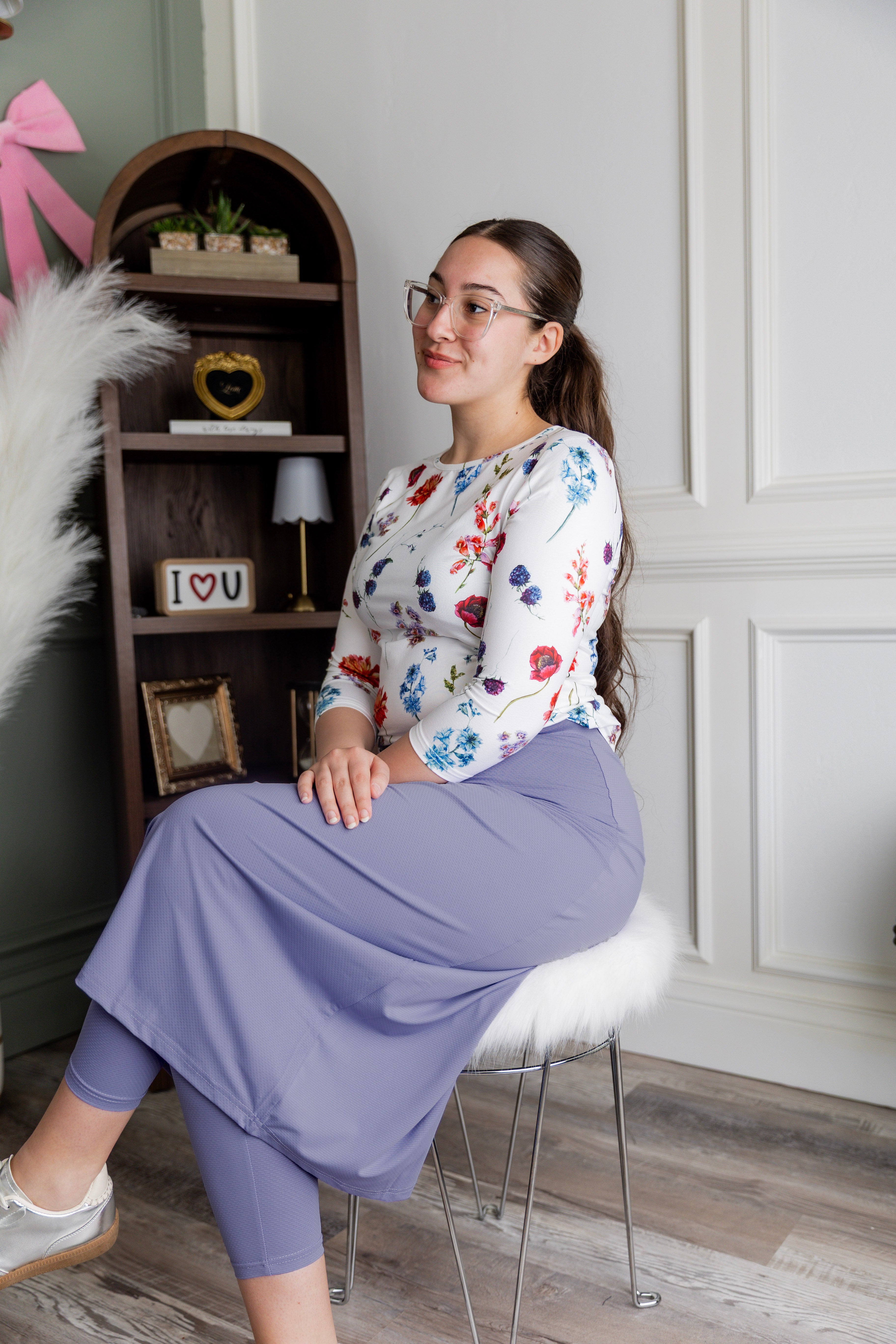 Model wearing Nuggles® 31" All-Sport Skirt in Pastel Purple