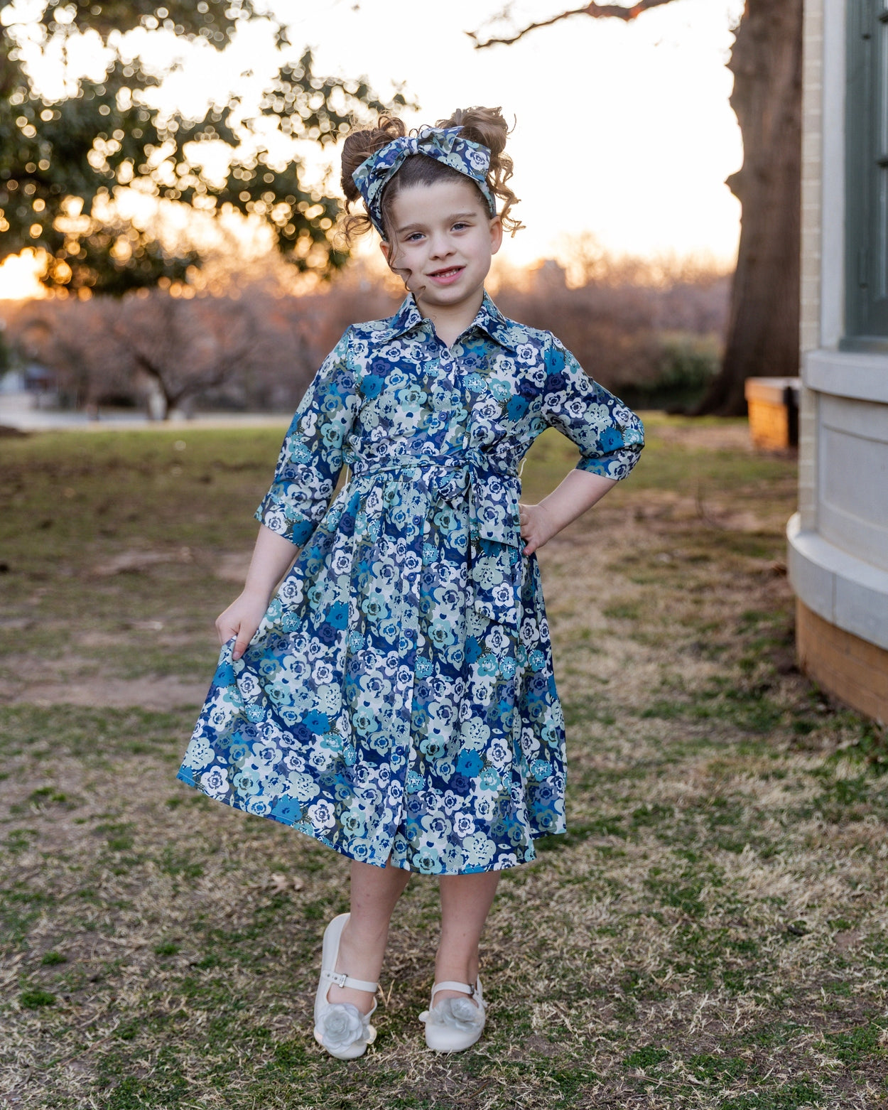 Model wearing the Nuggles® Girls' Rachel Dress in Storm Brush