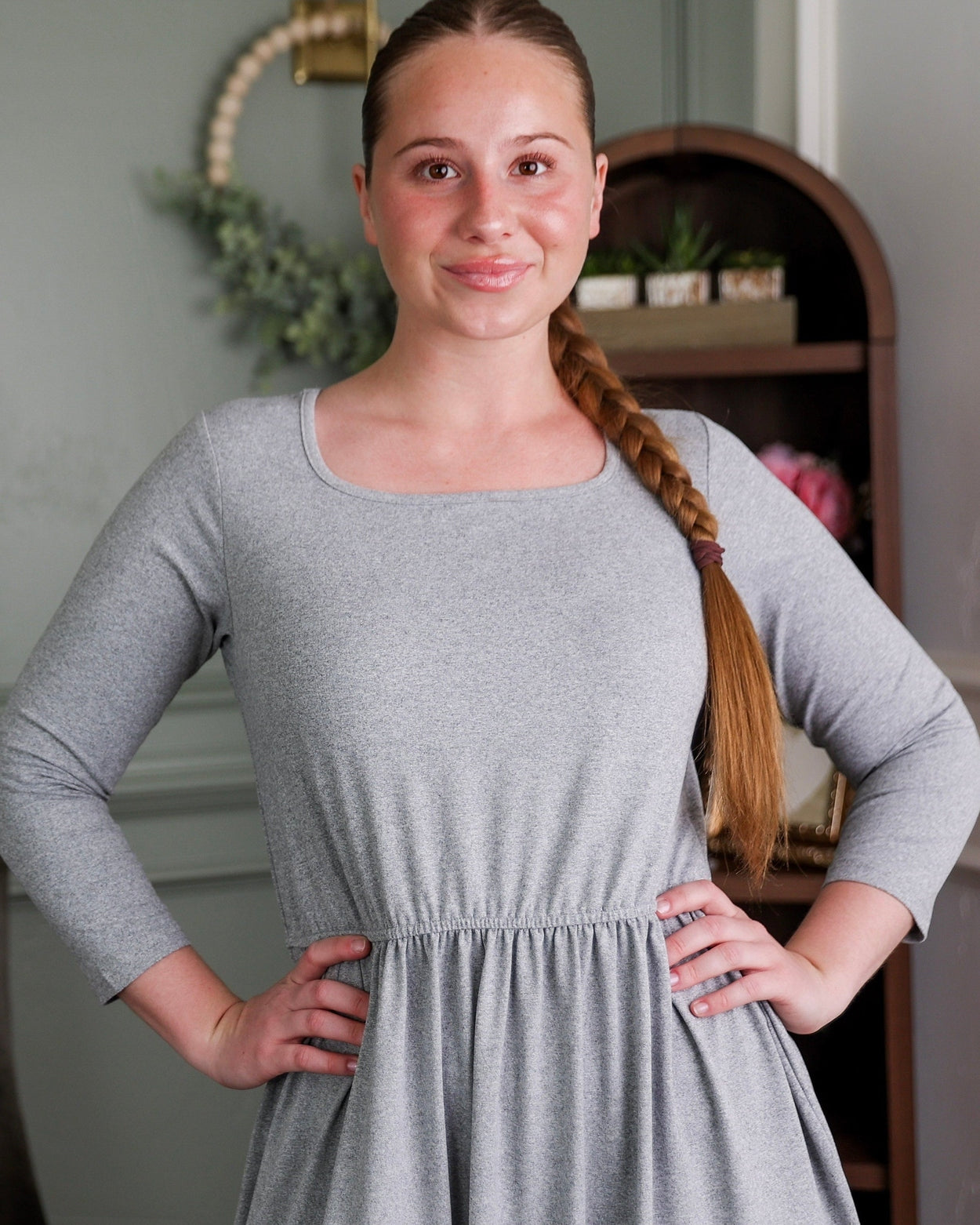 Model wearing Nuggles® Nova Dress in Heather Gray