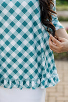 Model wearing the Avery Top, featuring modest 3/4 sleeves and a flowy, flattering fit.