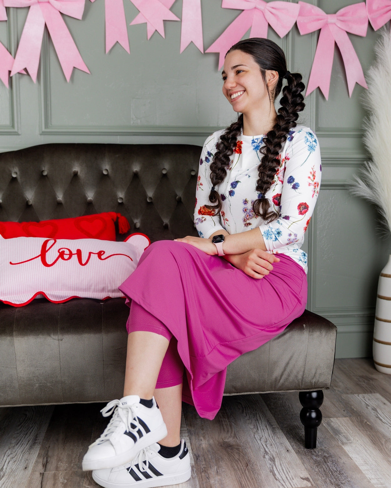 Model wearing Nuggles® 31" All-Sport Skirt in Hot Pink