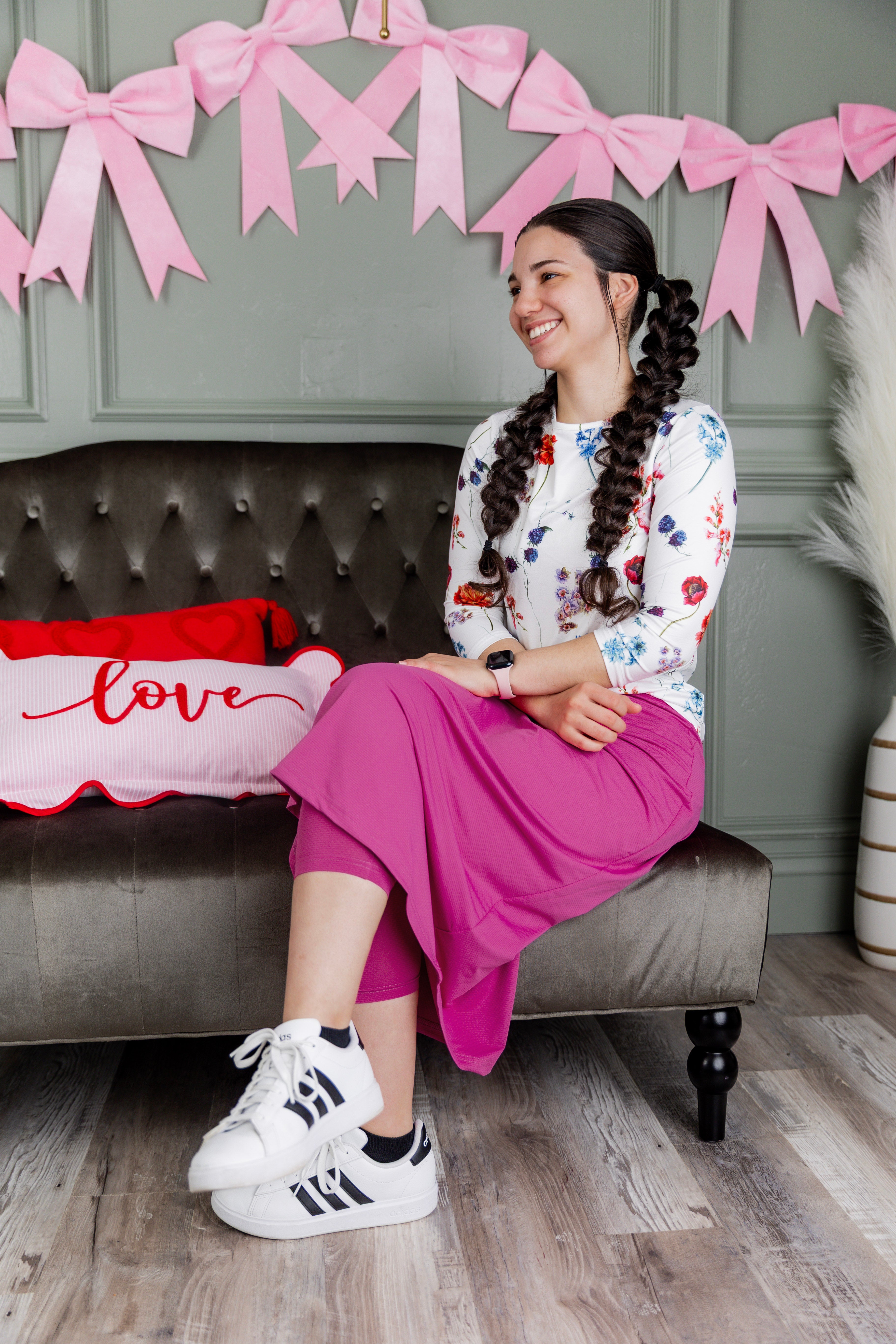 Model wearing Nuggles® 31" All-Sport Skirt in Hot Pink