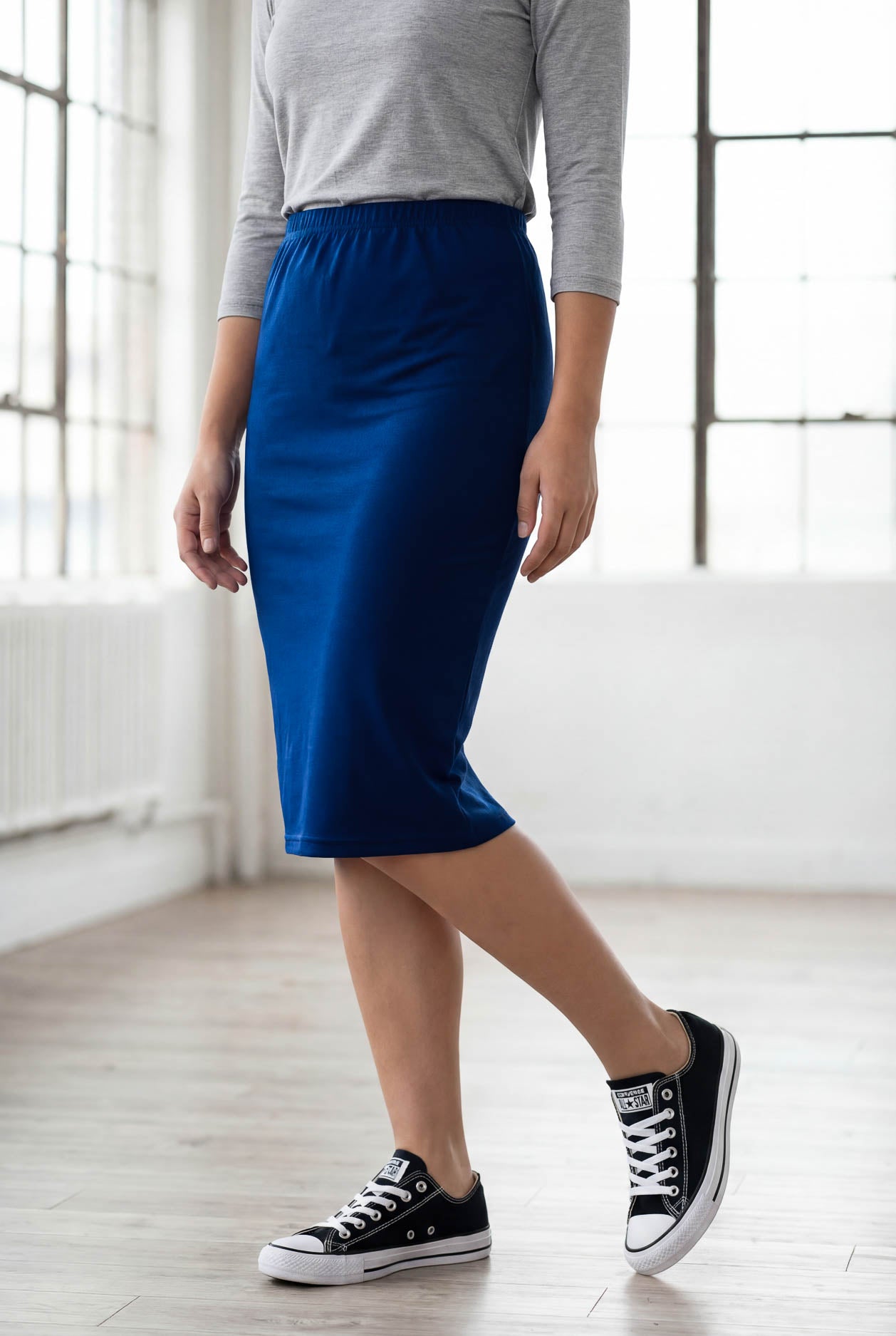 Model wearing Nuggles® 25" Classic Skirt in Dark Royal