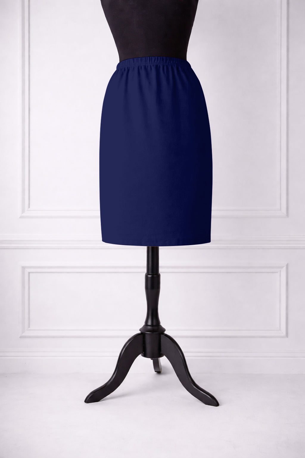 Stock photo of our Nuggles® 25-inch classic skirt elastic waistband and straight silhouette in Dark Royal