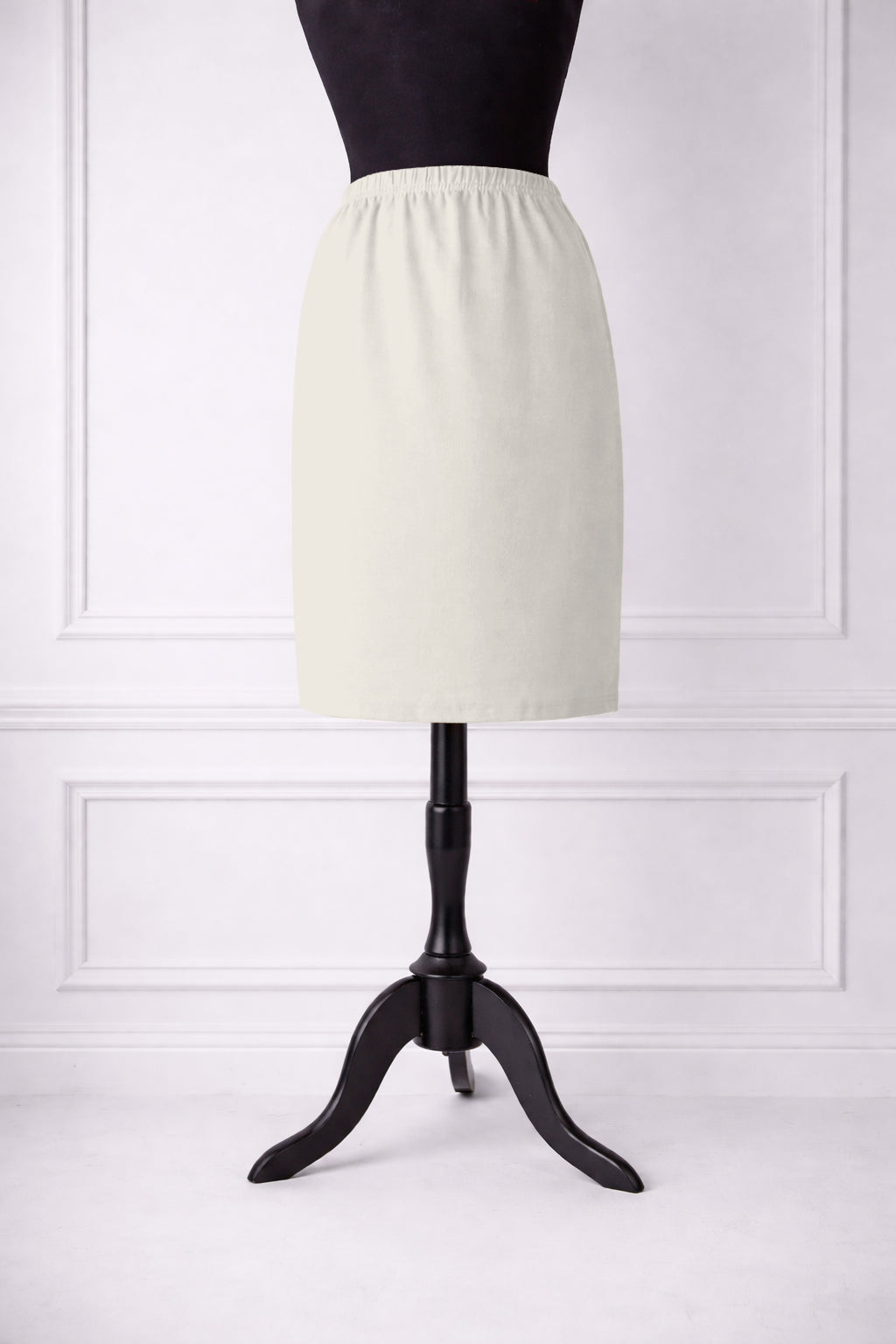 Stock photo of our Nuggles® 25-inch classic skirt elastic waistband and straight silhouette in off White