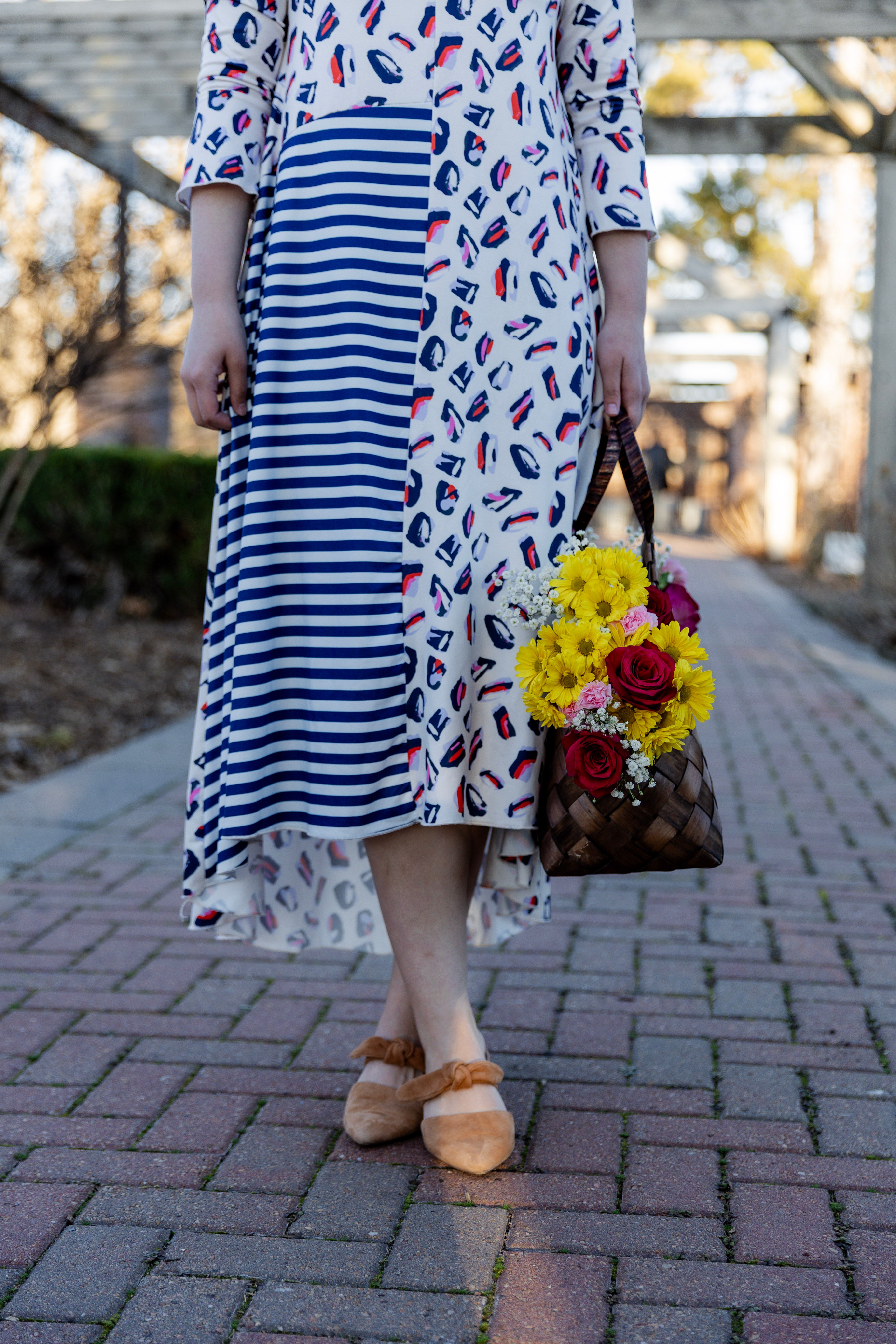 Modest high low knit dress with asymmetrical hem, ruffle sleeves, and mixed front prints – Kristine Dress by Nuggles®