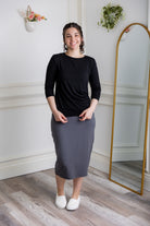 27-inch inch modest midi tee skirts in solid colors, prints, featuring a wide yoga-style waistband and soft stretch t-shirt fabric