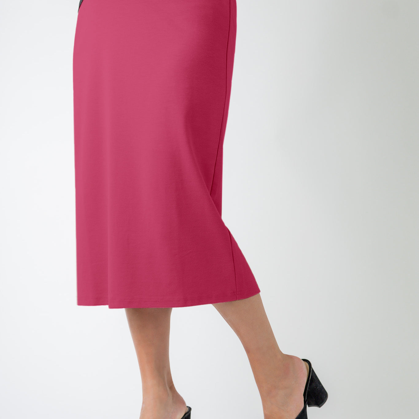 27" relaxed midi skirt displayed in a modest, mid-length cut with a smooth finish.