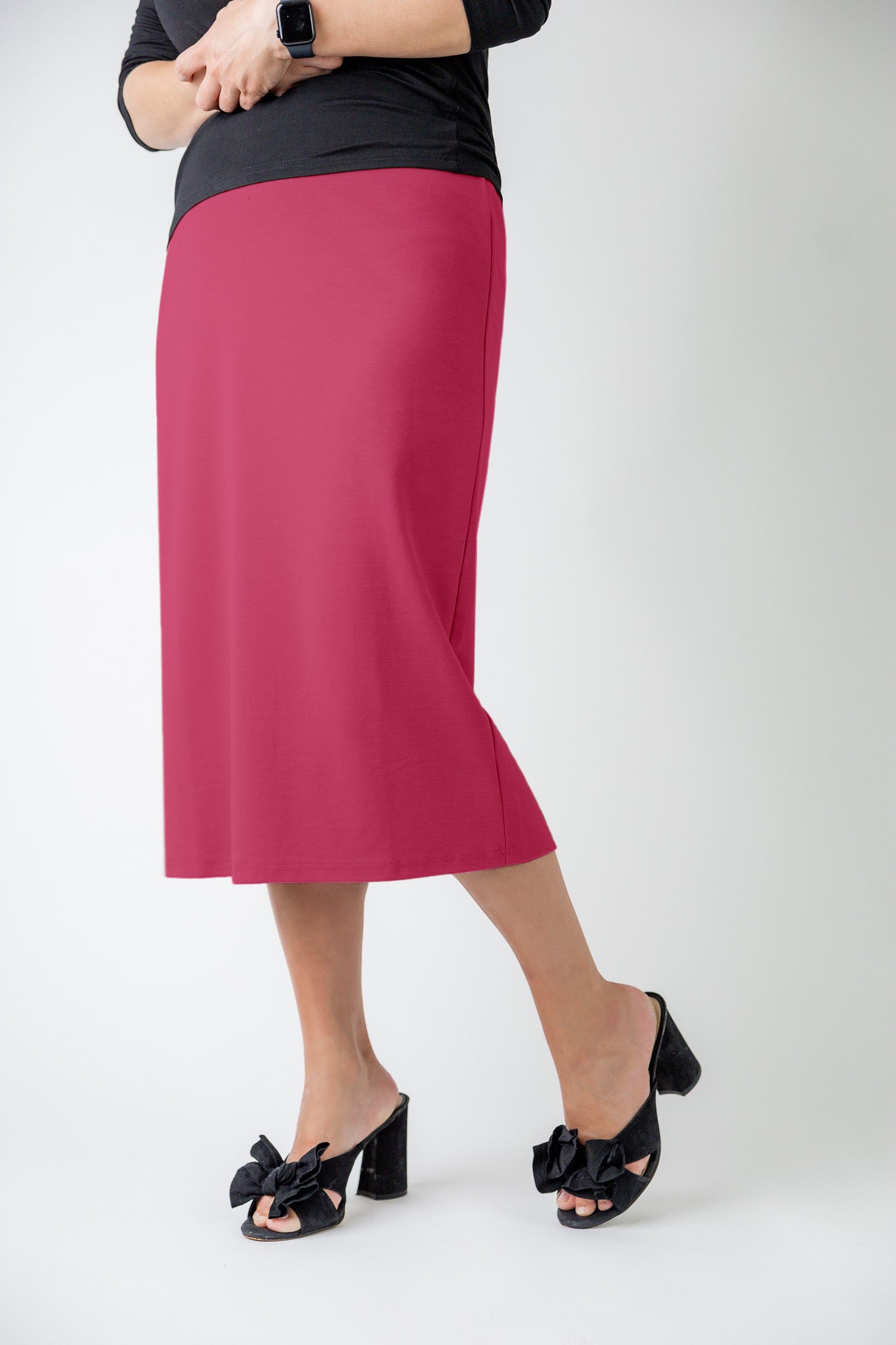 27" relaxed midi skirt displayed in a modest, mid-length cut with a smooth finish.