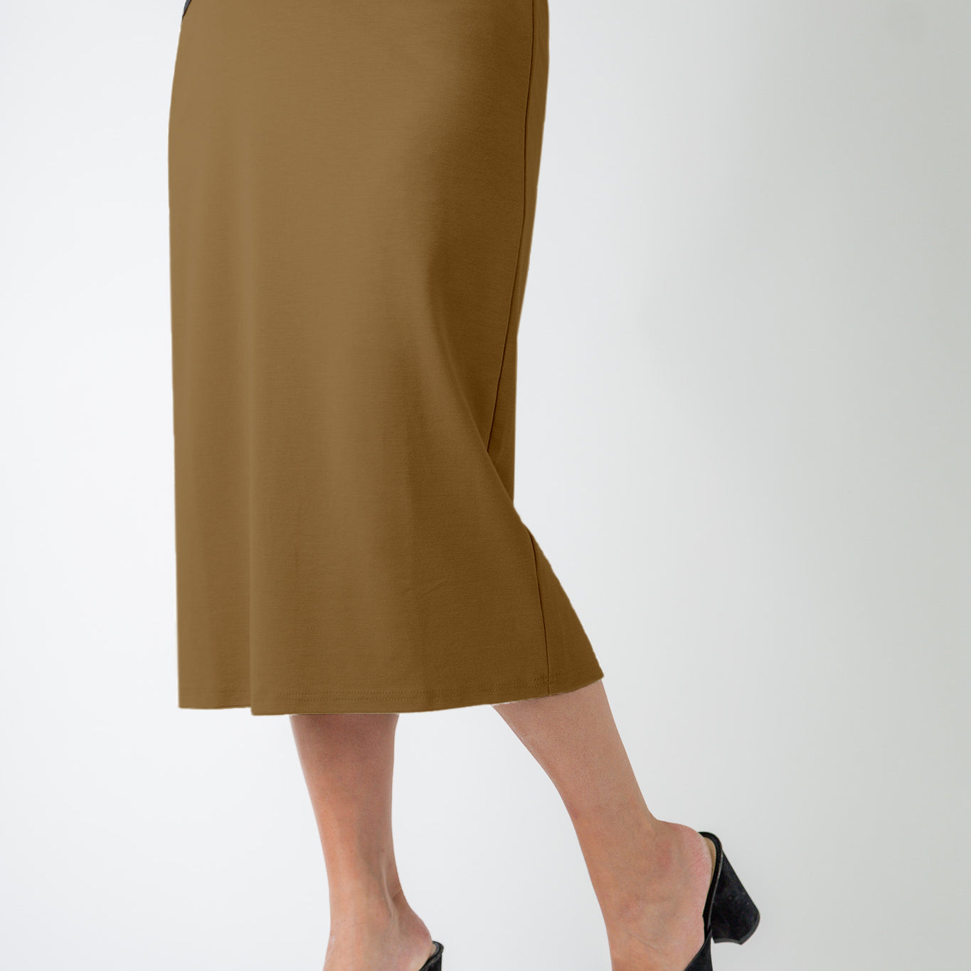 27" relaxed midi skirt displayed in a modest, mid-length cut with a smooth finish.