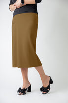 27" relaxed midi skirt displayed in a modest, mid-length cut with a smooth finish.