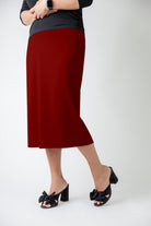 27" relaxed midi skirt displayed in a modest, mid-length cut with a smooth finish.