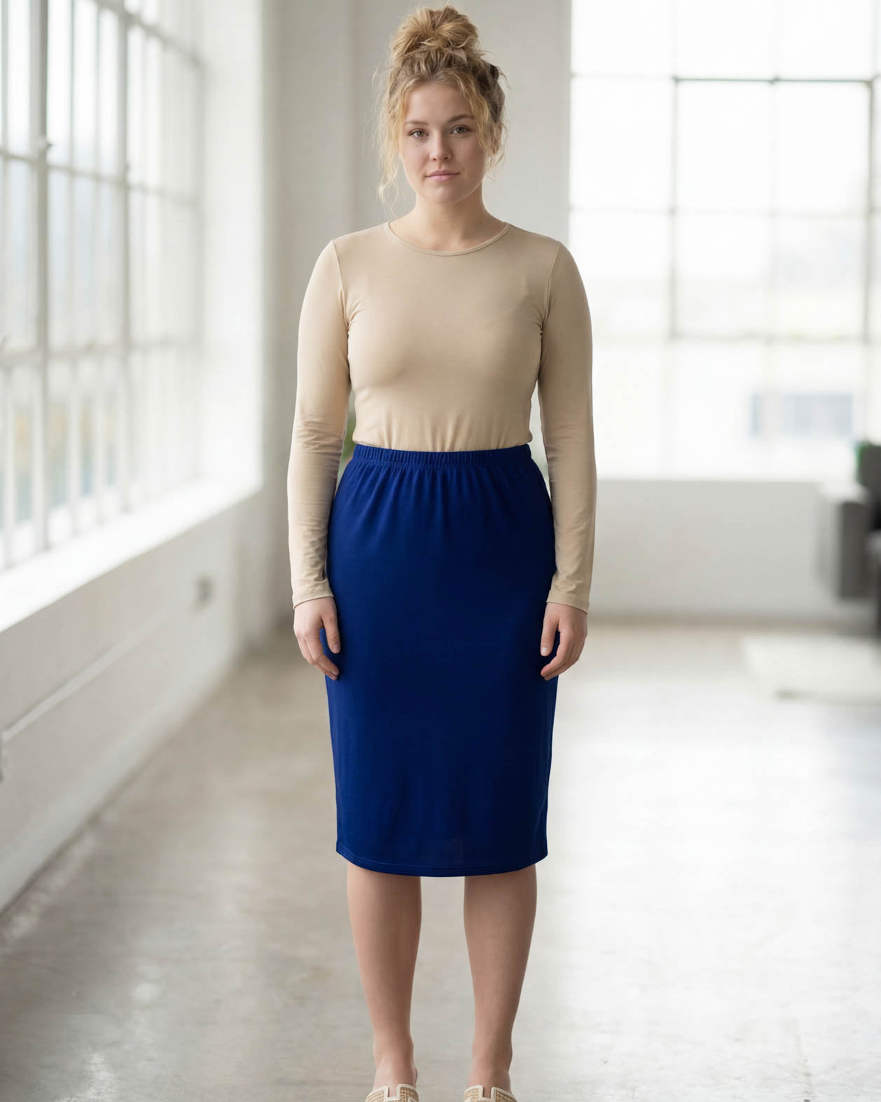 Model wearing Nuggles® 27" Classic Skirt in Dark Royal