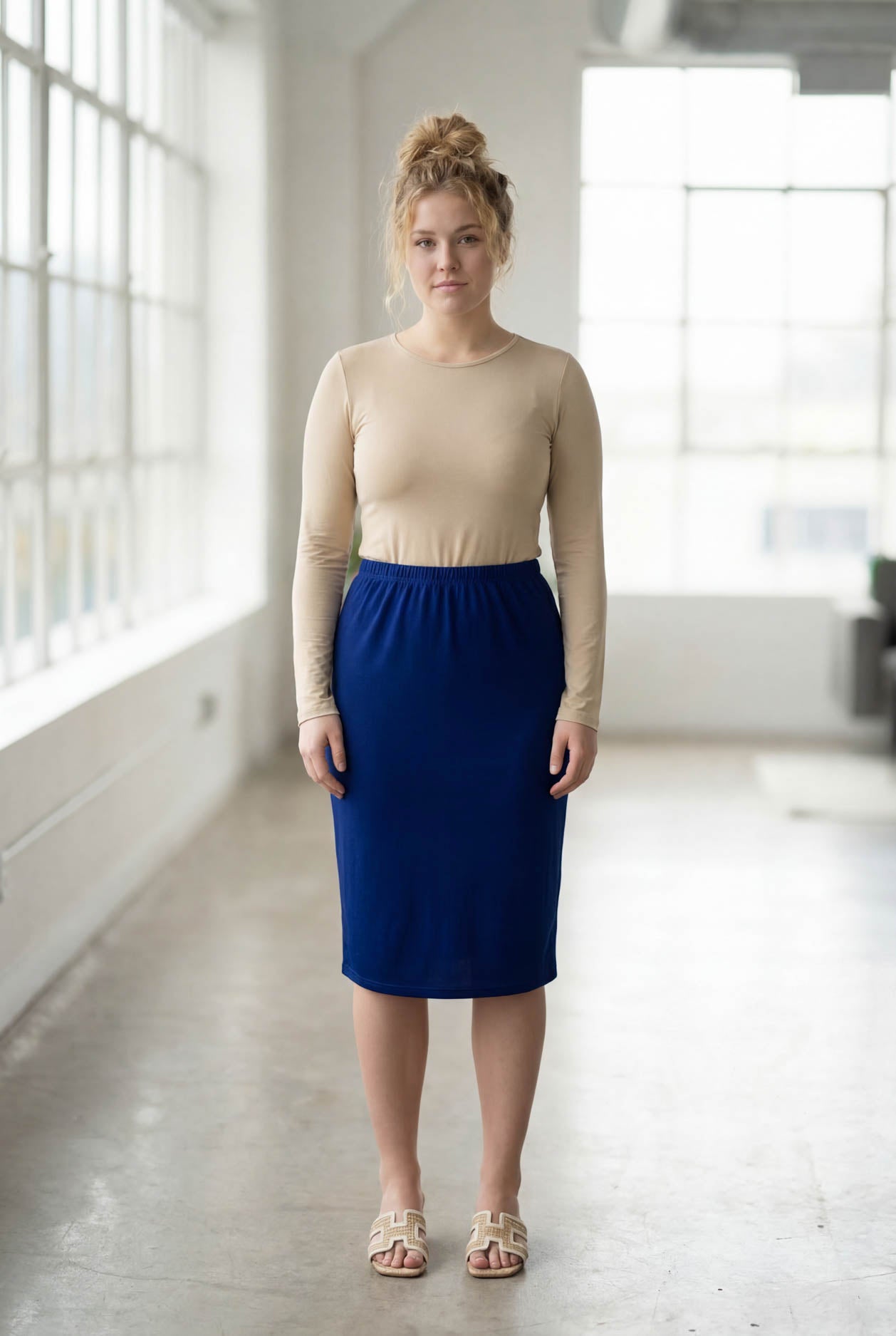 Model wearing Nuggles® 27" Classic Skirt in Dark Royal