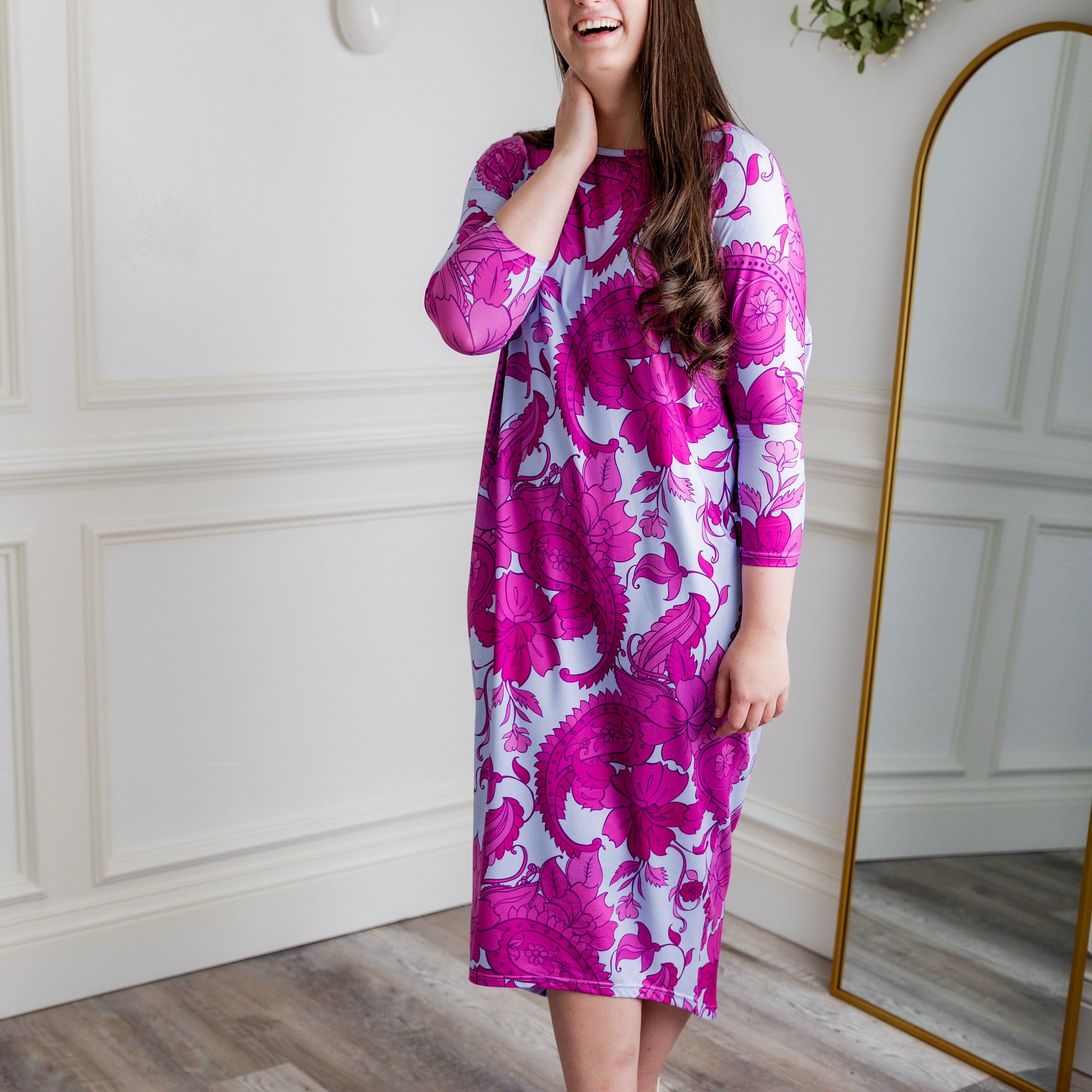 Modest dolman sleeve dress for women with relaxed fit and tapered hem, made from soft stretch knit fabric – perfect for everyday wear.