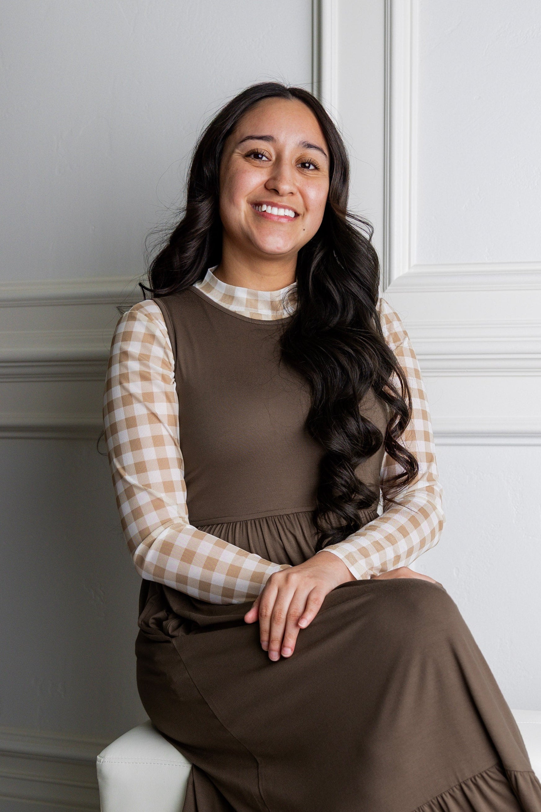 Model wearing the Nuggles® Riley Dress in Mocha Brown and Mesh Tee in Sugarcone Gingham