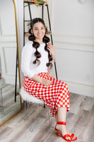 Model wearing Nuggles® 31-inch Drawstring T-Skirt in prints. Modest midi skirt with side pockets, soft stretch waistband, and adjustable drawstring. Lightweight knit fabric, perfect for everyday comfort and style.