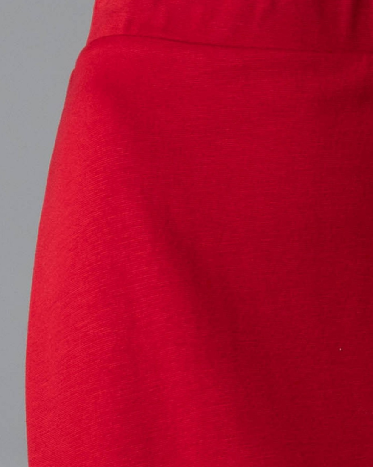 Model wearing Nuggles® 25" Relaxed Midi Skirt in Red