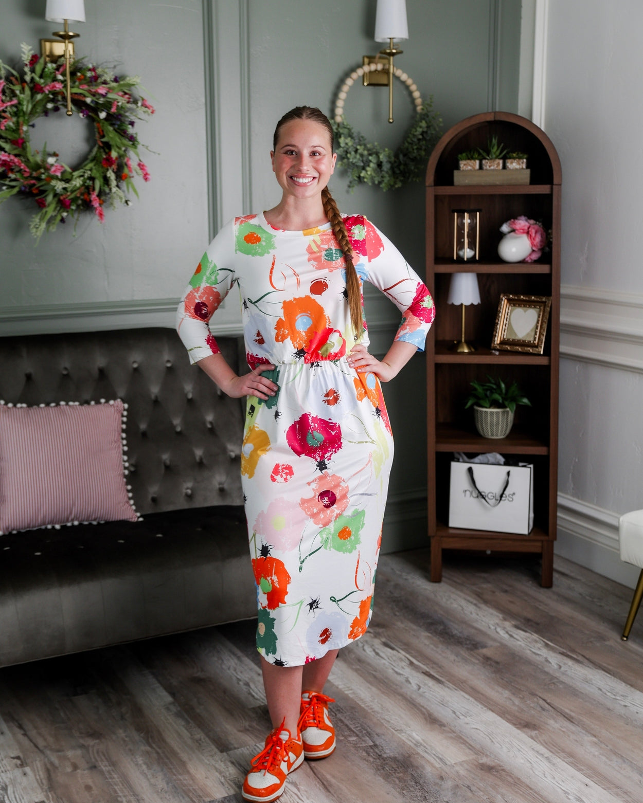 Model wearing Nuggles® Harper Jane Dress in Party Blooms