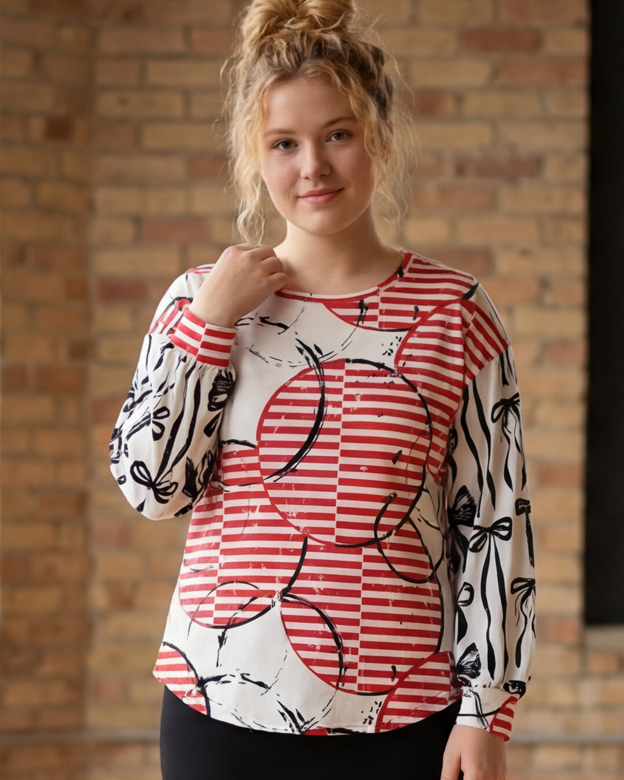 Model wearing Nuggles® Bryauna Top in Boardwalk Bows