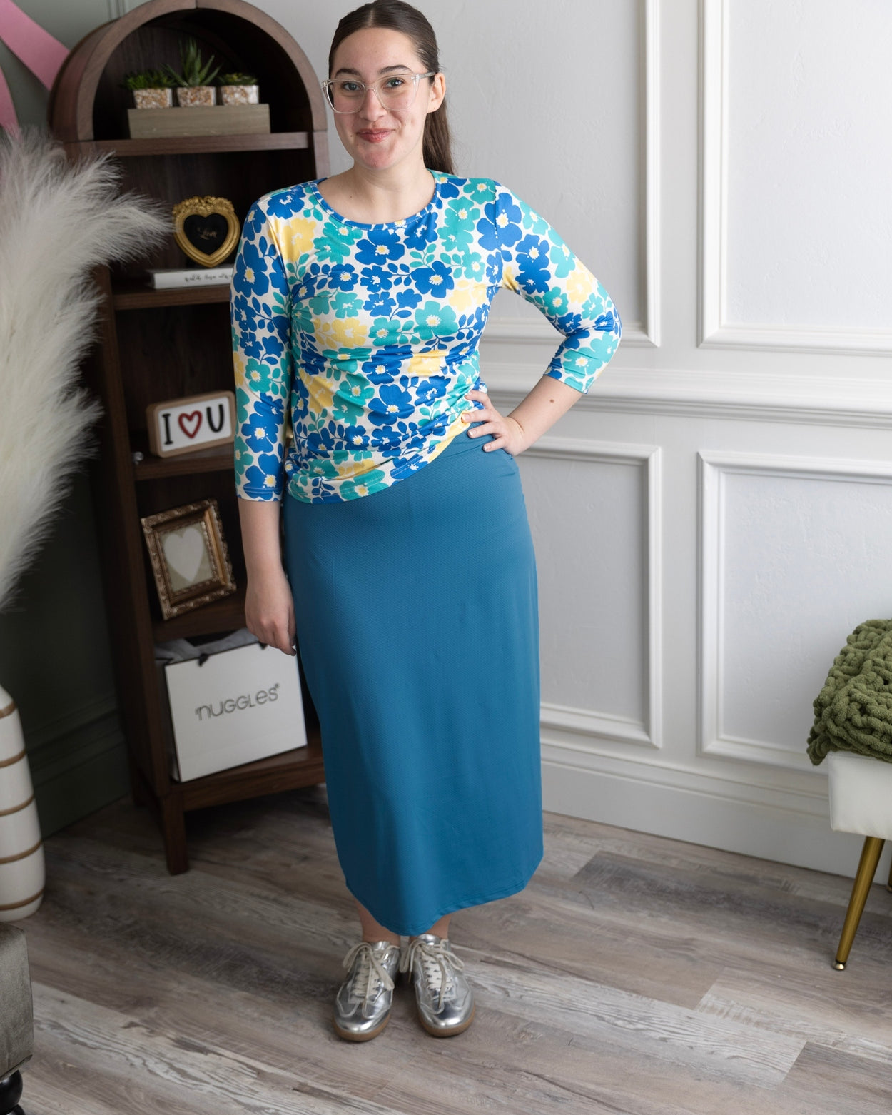 Model wearing Nuggles® 31" All-Sport Skirt in Turquoise