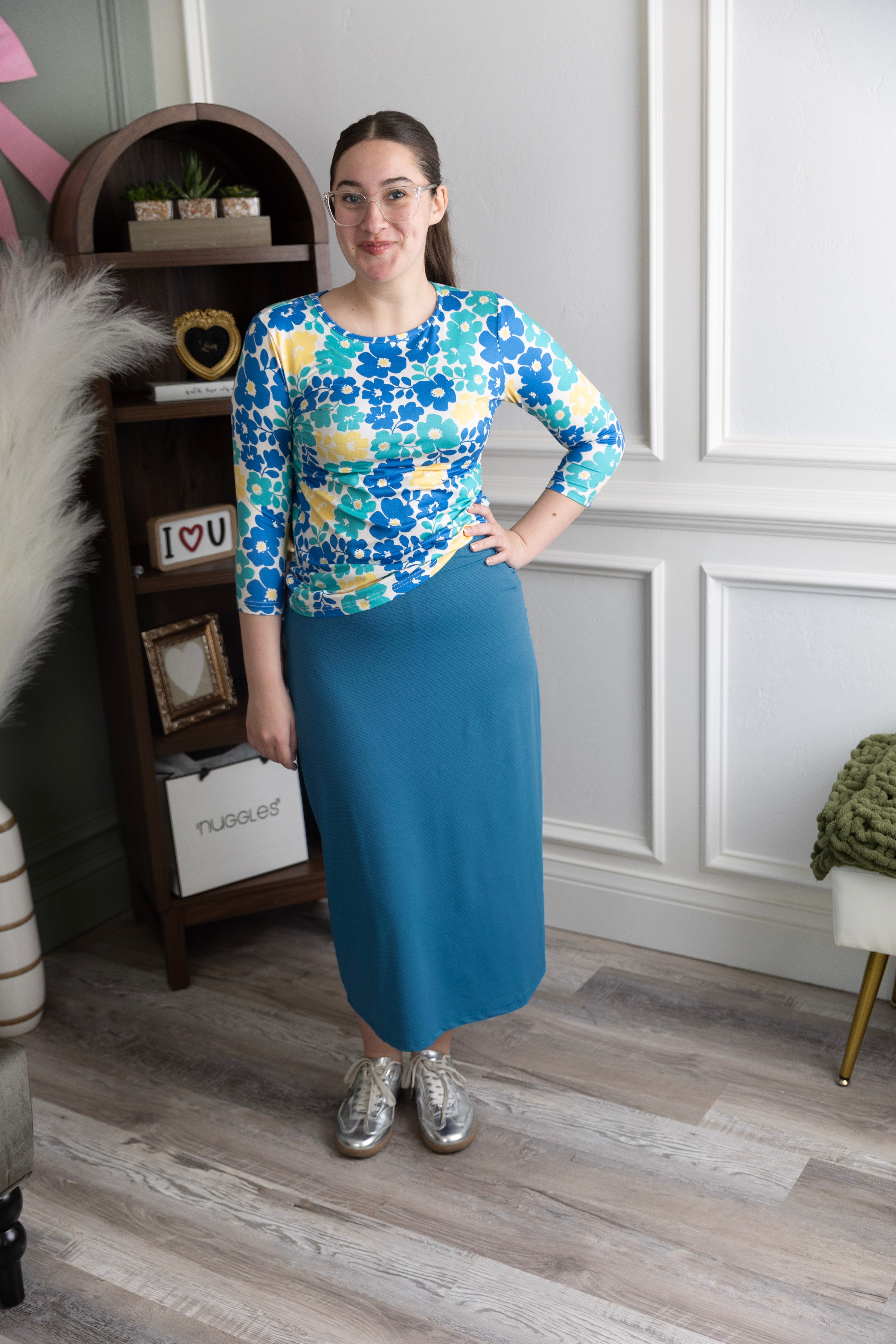 Model wearing Nuggles® 31" All-Sport Skirt in Turquoise