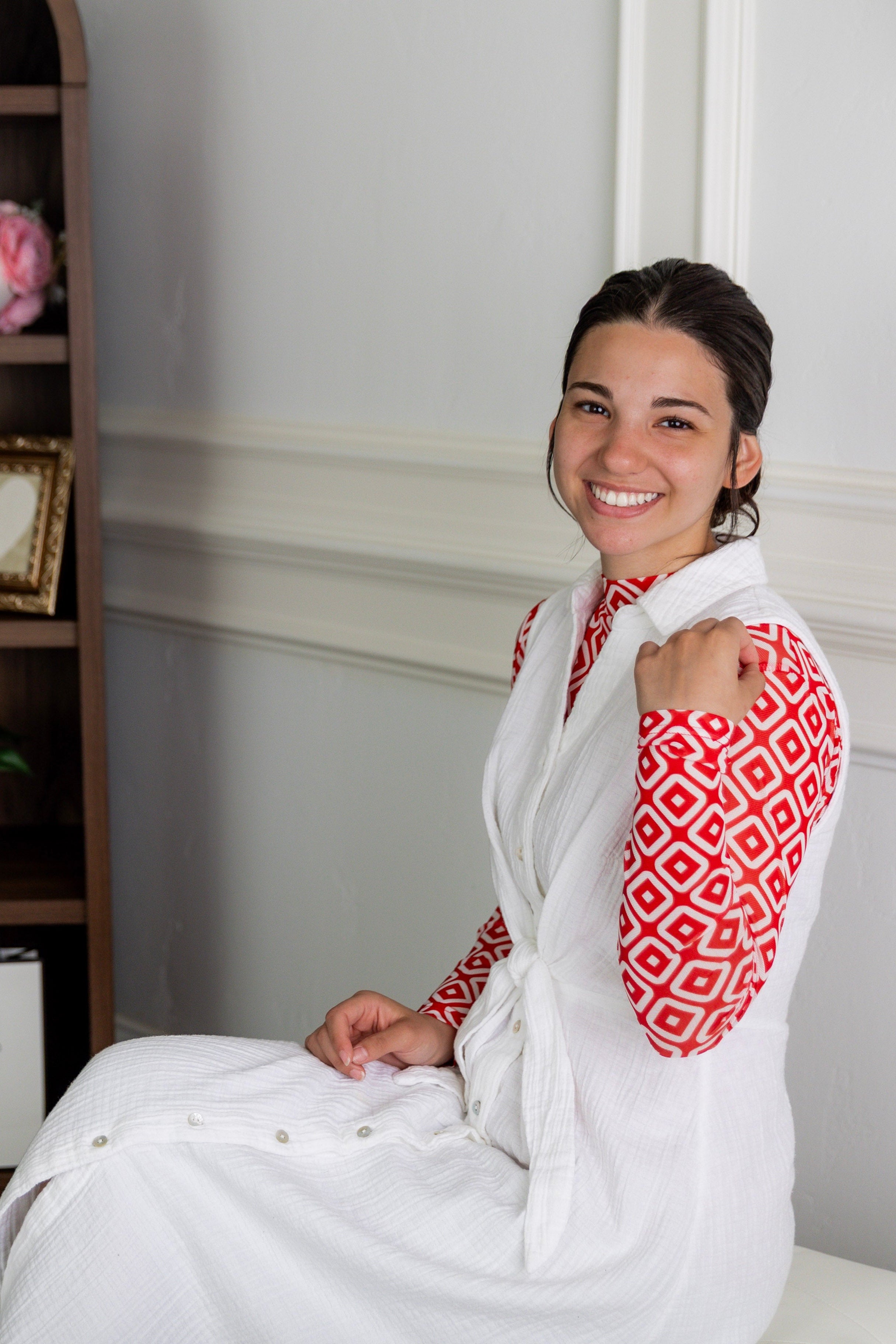 Model wearing Nuggles® Mesh Tee in Candy Apple Geo