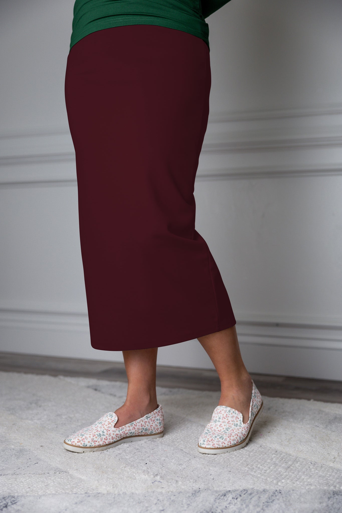 31"Modest knit midi skirt with elastic waistband, available in various colors and lengths—27, 31, and 34 inches.